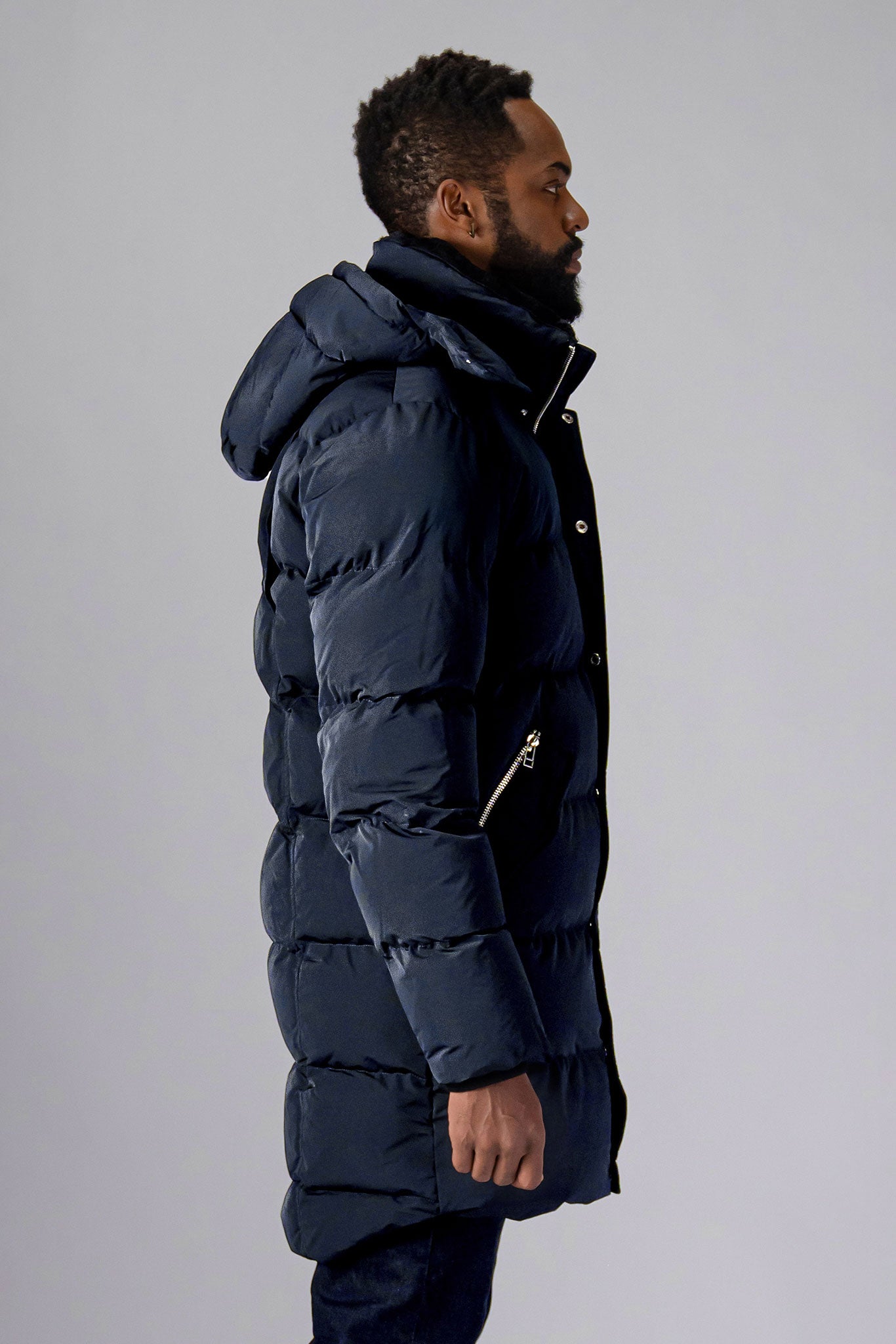 Woodpecker Men's Penguin Long Winter coat. High-end Canadian designer winter coat for men in "Blue Diamond" colour. Woodpecker cruelty-free winter coat designed in Canada. Men's heavy weight long length premium designer jacket for winter. Superior quality warm winter coat for men. Moose Knuckles, Canada Goose, Mackage, Montcler, Will Poho, Willbird, Nic Bayley. Extra warm. Shiny parka. Stylish winter jacket. Designer winter coat.