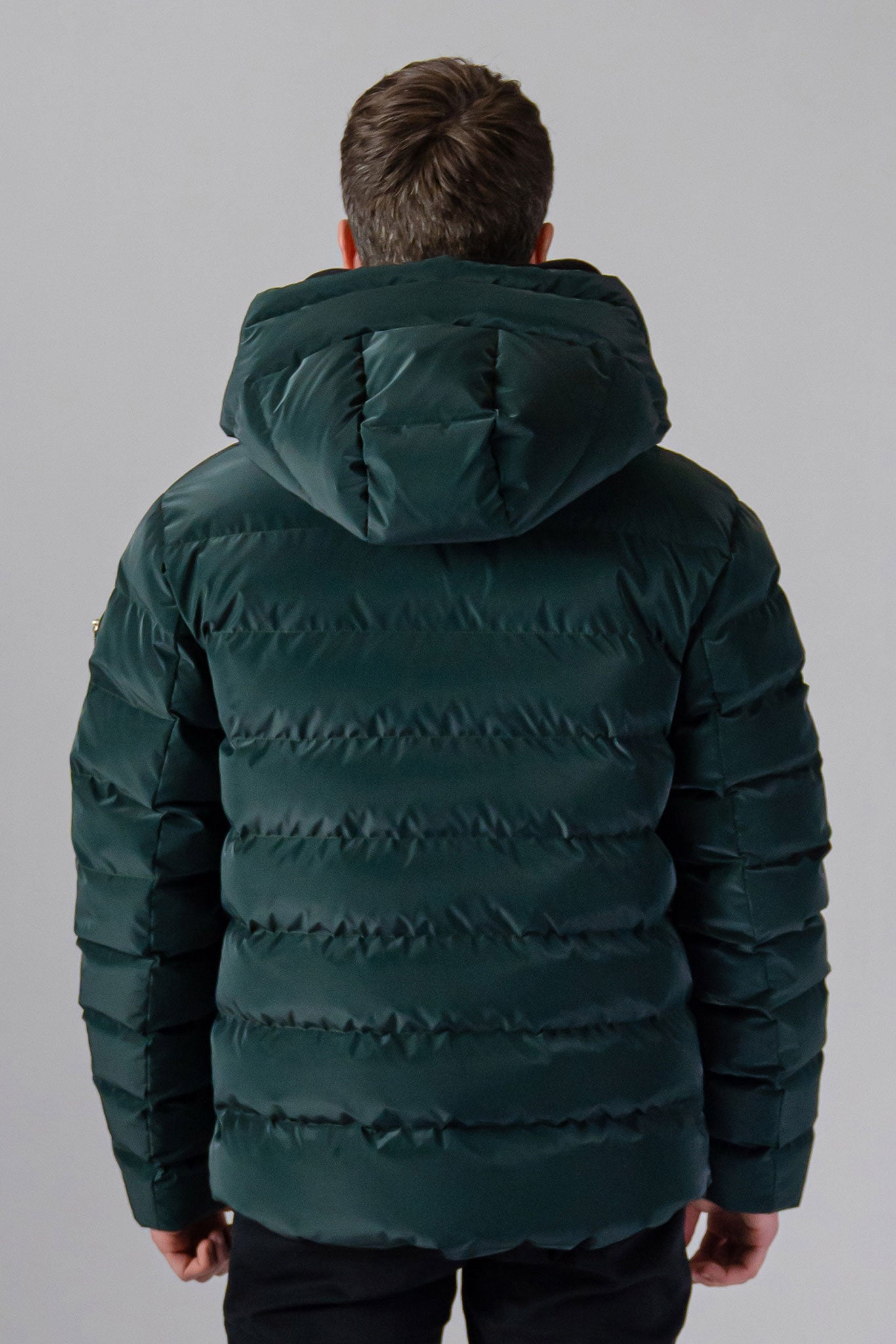 Woodpecker Men's Sparrow Winter coat. High-end Canadian designer winter coat for men in "Green Diamond" colour. Woodpecker cruelty-free winter coat designed in Canada. Men's medium weight medium length premium designer jacket for winter. Superior quality warm winter coat for men. Moose Knuckles, Canada Goose, Mackage, Montcler, Will Poho, Willbird, Nic Bayley. Shiny parka. Stylish winter jacket. Designer winter coat.