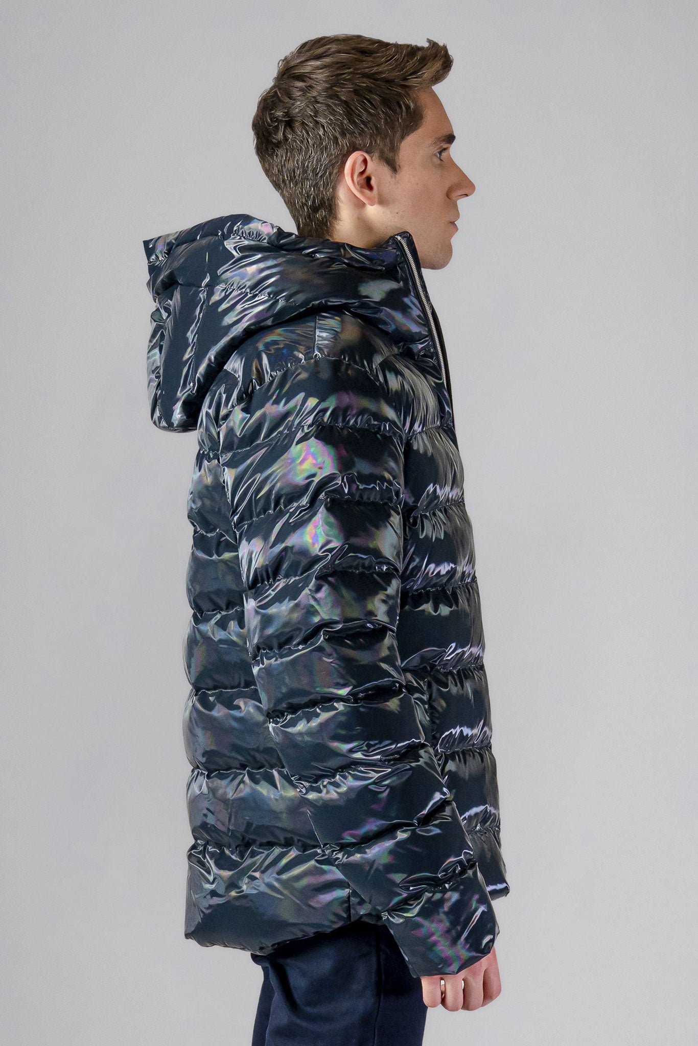 High-end Canadian designer winter coat for men in "Raven Black" colour. Woodpecker cruelty-free winter coat designed in Canada. Men's medium weight medium length premium designer jacket for winter. Superior quality warm winter coat for men. Moose Knuckles, Canada Goose, Mackage, Montcler, Will Poho, Willbird, Nic Bayley. Shiny parka. Stylish winter jacket. Designer winter coat.