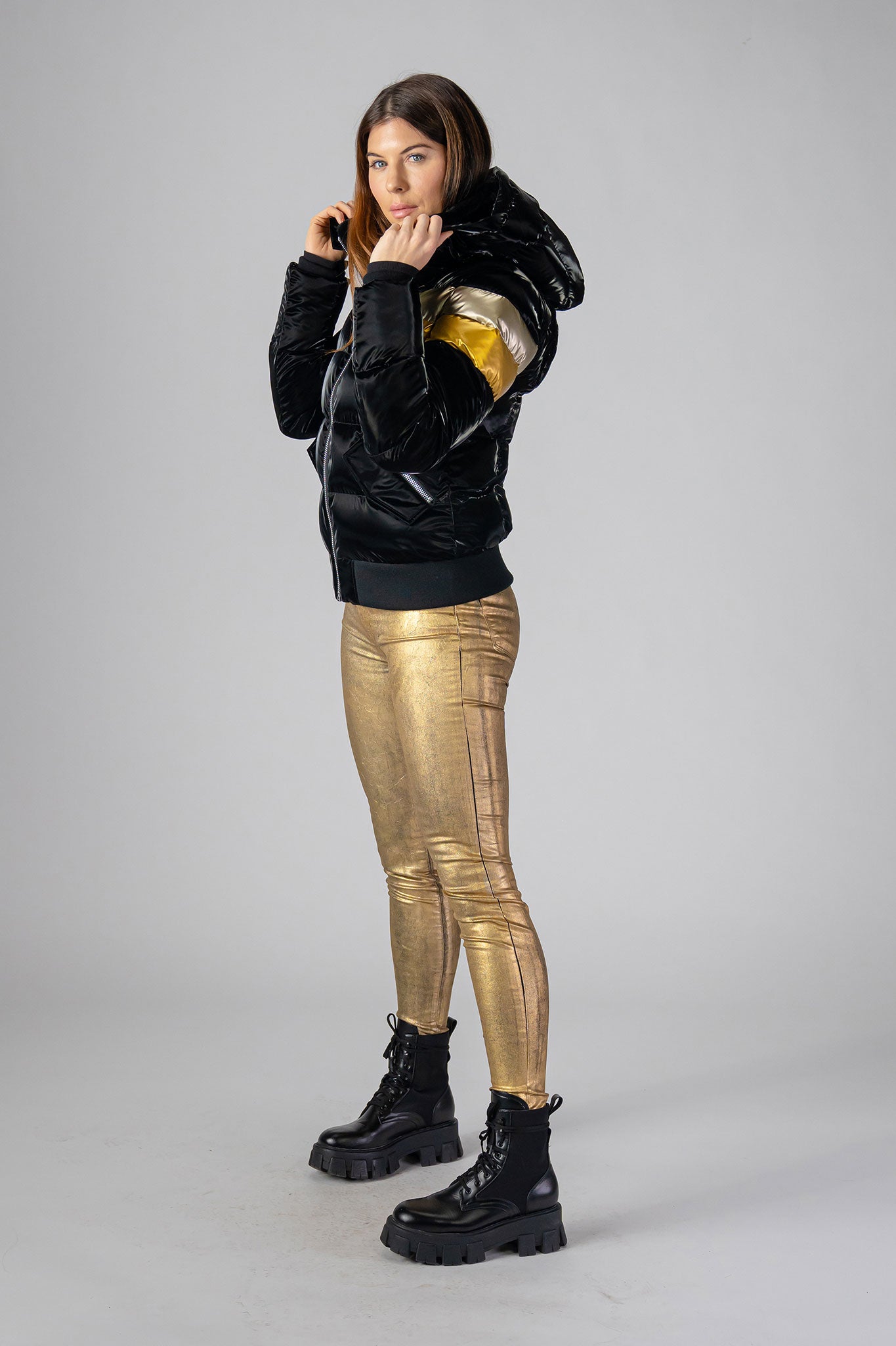 Woodpecker Women's Woody Bomber Winter coat. High-end Canadian designer winter coat for women in "Firebird" colour. Woodpecker cruelty-free winter coat designed in Canada. Women's heavy weight short length premium designer jacket for winter. Superior quality warm winter coat for women. Moose Knuckles, Canada Goose, Mackage, Montcler, Will Poho, Willbird, Nic Bayley. Shiny parka. Stylish winter jacket. Designer winter coat.