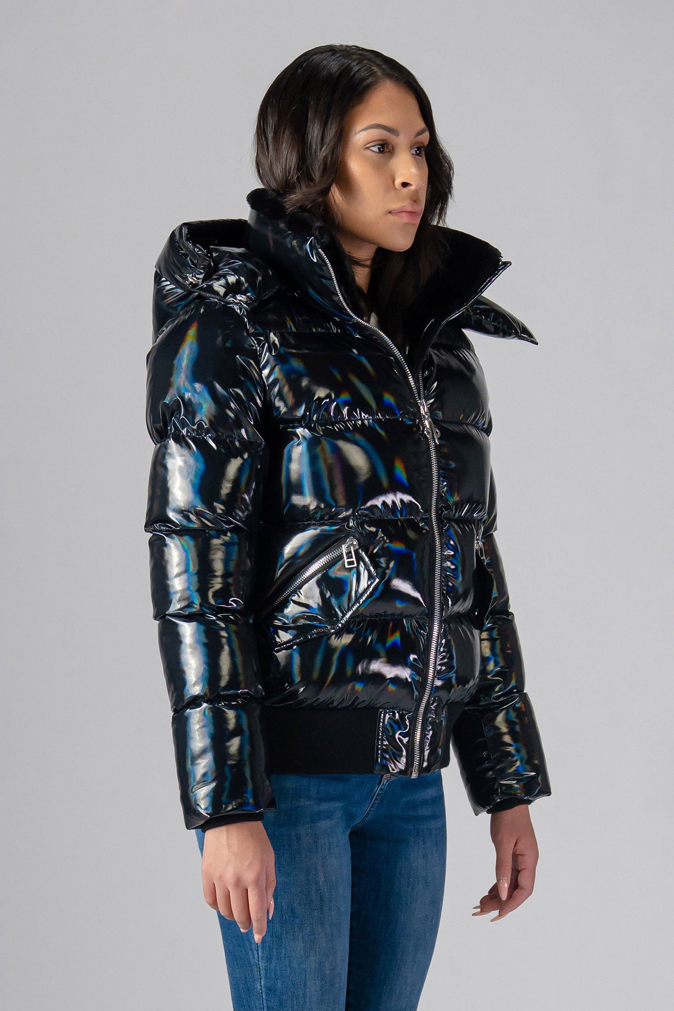 Woodpecker Women's Woody Bomber Winter coat. High-end Canadian designer winter coat for women in "Oily Black" colour. Woodpecker cruelty-free winter coat designed in Canada. Women's heavy weight short length premium designer jacket for winter. Superior quality warm winter coat for women. Moose Knuckles, Canada Goose, Mackage, Montcler, Will Poho, Willbird, Nic Bayley. Shiny parka. Stylish winter jacket. Designer winter coat.