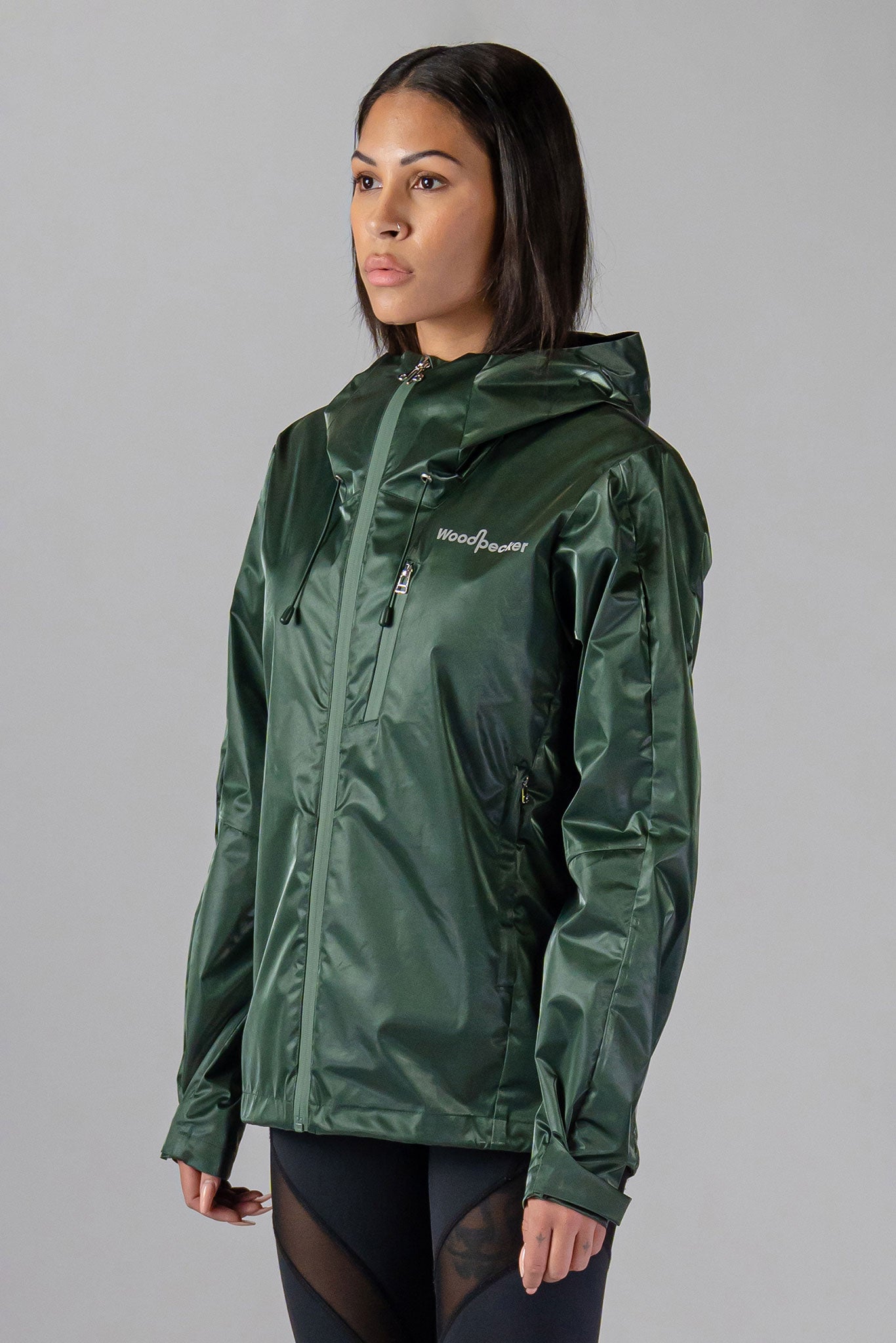 Woodpecker Women's Wind Shell coat. High-end Canadian designer activewear coat for women in "Green Diamond" colour. Woodpecker coat designed in Canada. Moose Knuckles, Canada Goose, Mackage, Montcler, Will Poho, Willbird, Nic Bayley.
