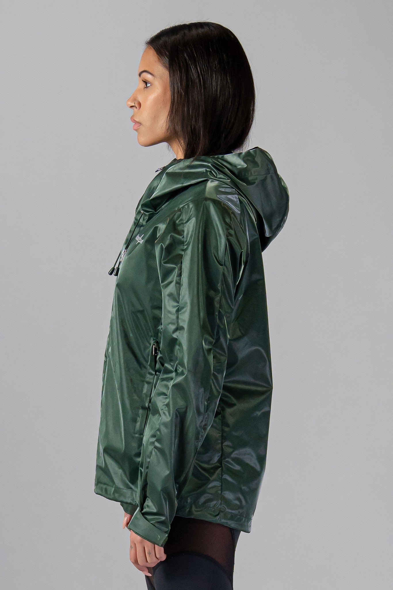 Woodpecker Women's Wind Shell coat. High-end Canadian designer activewear coat for women in "Green Diamond" colour. Woodpecker coat designed in Canada. Moose Knuckles, Canada Goose, Mackage, Montcler, Will Poho, Willbird, Nic Bayley.