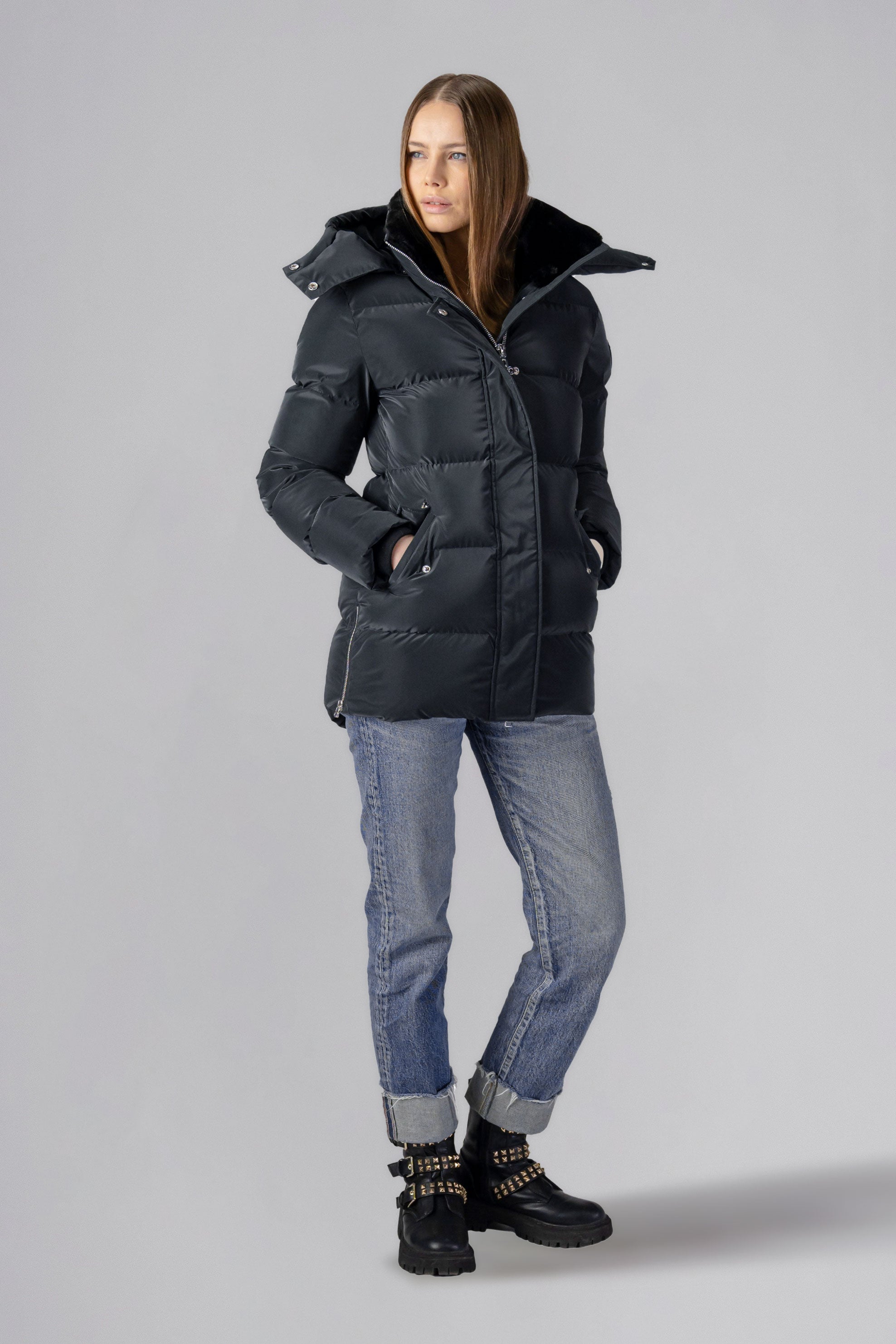 Woodpecker Women's Bumnester Winter coat. High-end Canadian designer winter coat for women in shiny "Black Diamond" colour. Woodpecker cruelty-free winter coat designed in Canada. Women's heavy weight medium length premium designer jacket for winter. Superior quality warm winter coat for women. Moose Knuckles, Canada Goose, Mackage, Montcler, Will Poho, Willbird, Nic Bayley. Extra warm. Shiny parka. Stylish winter jacket. Designer winter coat.