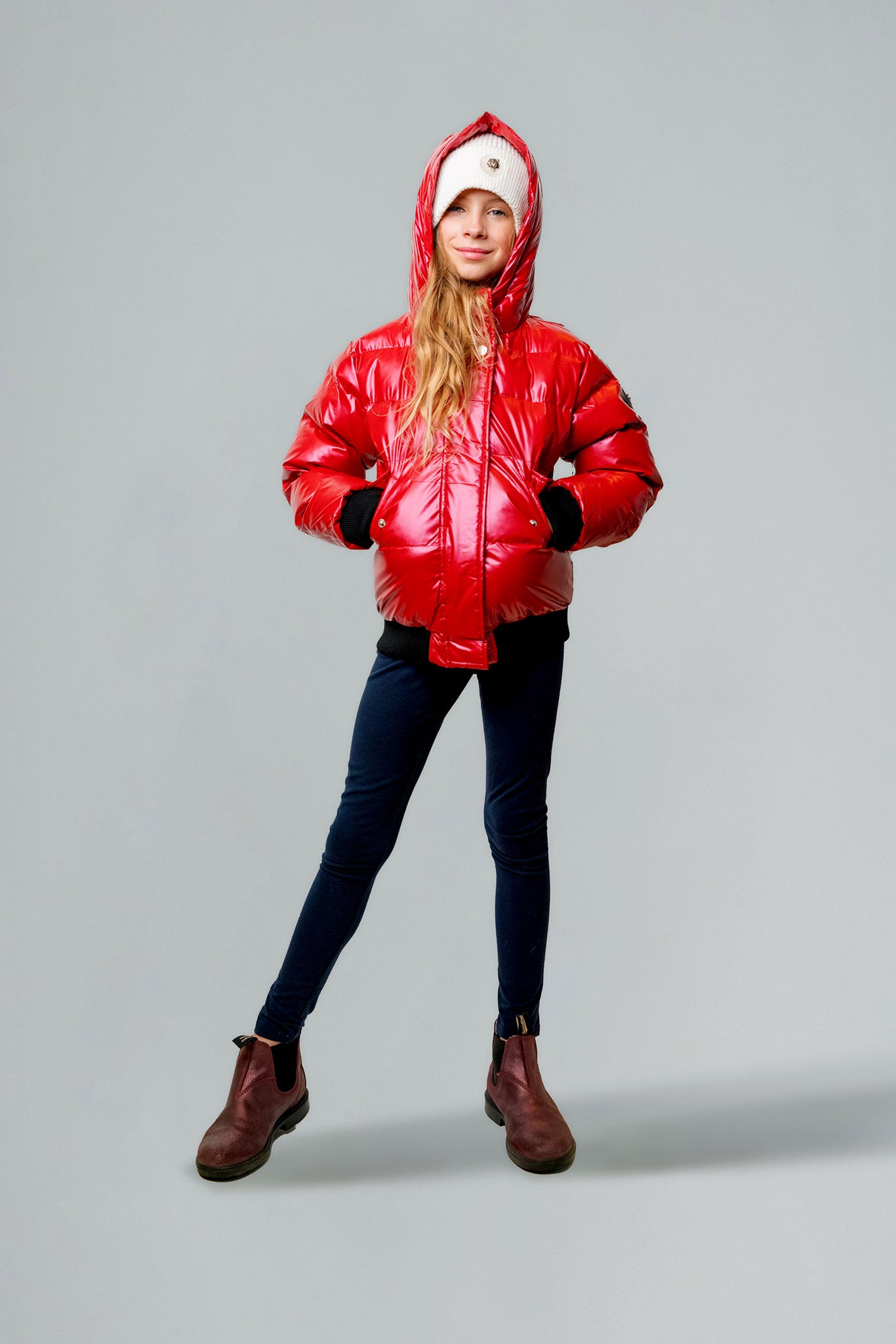 Woodpecker Kids' Chickadee Winter coat. High-end Canadian designer winter coat for Kids in "Raspberry" colour. Woodpecker cruelty-free winter coat designed in Canada. Kids' heavy weight short length premium designer jacket for winter. Superior quality warm winter coat for kids. Moose Knuckles, Canada Goose, Mackage, Montcler, Will Poho, Willbird, Nic Bayley. Extra warm. Shiny parka. Stylish winter jacket. Designer winter coat.