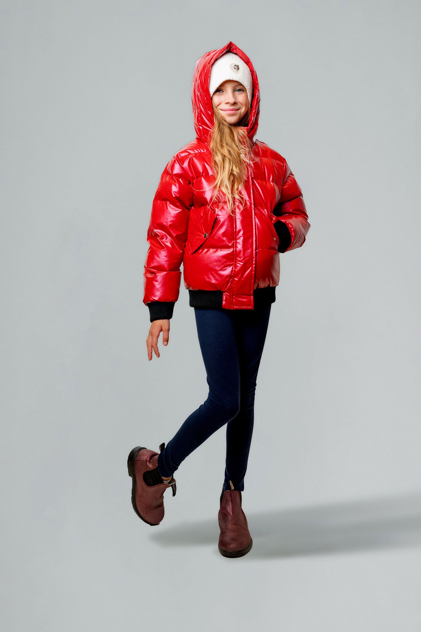 Woodpecker Kids' Chickadee Winter coat. High-end Canadian designer winter coat for Kids in "Raspberry" colour. Woodpecker cruelty-free winter coat designed in Canada. Kids' heavy weight short length premium designer jacket for winter. Superior quality warm winter coat for kids. Moose Knuckles, Canada Goose, Mackage, Montcler, Will Poho, Willbird, Nic Bayley. Extra warm. Shiny parka. Stylish winter jacket. Designer winter coat.