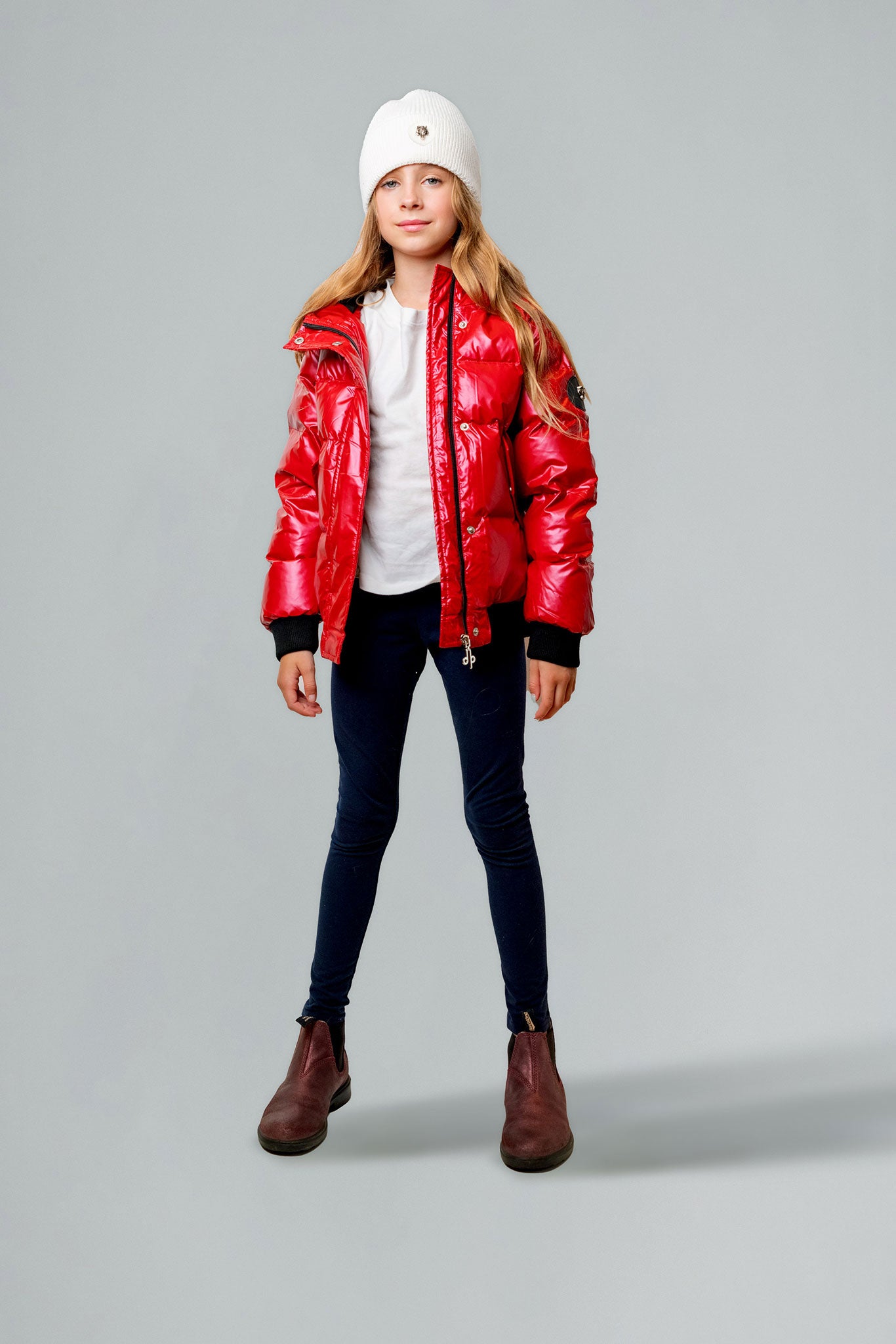 Woodpecker Kids' Chickadee Winter coat. High-end Canadian designer winter coat for Kids in "Raspberry" colour. Woodpecker cruelty-free winter coat designed in Canada. Kids' heavy weight short length premium designer jacket for winter. Superior quality warm winter coat for kids. Moose Knuckles, Canada Goose, Mackage, Montcler, Will Poho, Willbird, Nic Bayley. Extra warm. Shiny parka. Stylish winter jacket. Designer winter coat.