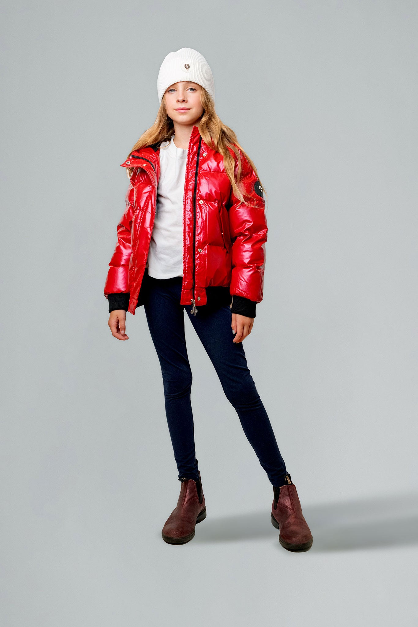 Woodpecker Kids' Chickadee Winter coat. High-end Canadian designer winter coat for Kids in "Raspberry" colour. Woodpecker cruelty-free winter coat designed in Canada. Kids' heavy weight short length premium designer jacket for winter. Superior quality warm winter coat for kids. Moose Knuckles, Canada Goose, Mackage, Montcler, Will Poho, Willbird, Nic Bayley. Extra warm. Shiny parka. Stylish winter jacket. Designer winter coat.