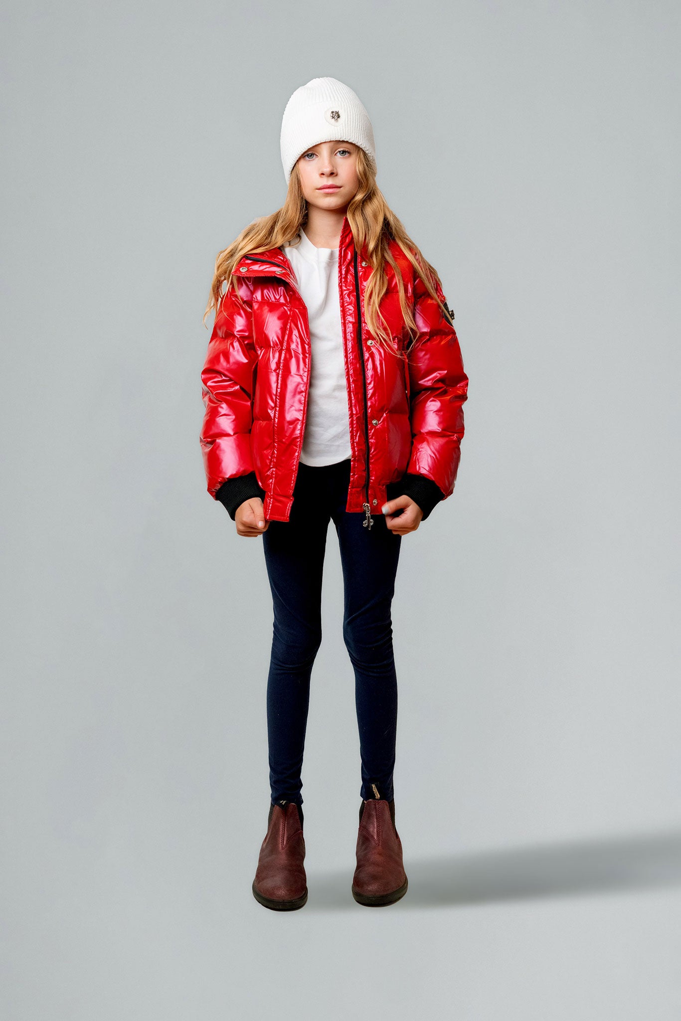 Woodpecker Kids' Chickadee Winter coat. High-end Canadian designer winter coat for Kids in "Raspberry" colour. Woodpecker cruelty-free winter coat designed in Canada. Kids' heavy weight short length premium designer jacket for winter. Superior quality warm winter coat for kids. Moose Knuckles, Canada Goose, Mackage, Montcler, Will Poho, Willbird, Nic Bayley. Extra warm. Shiny parka. Stylish winter jacket. Designer winter coat.