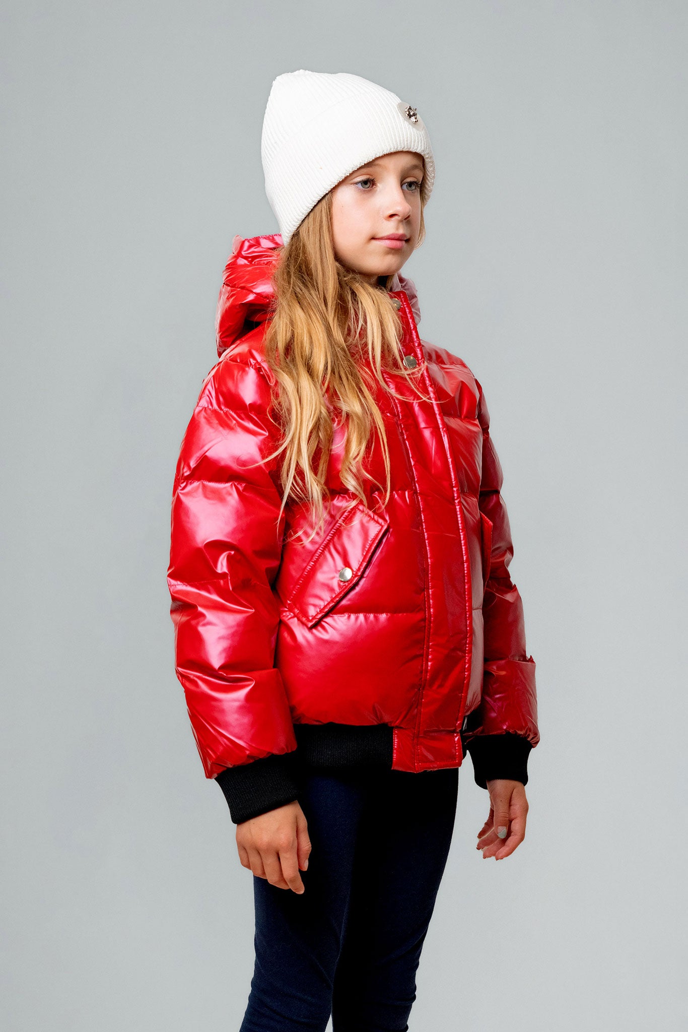 Woodpecker Kids' Chickadee Winter coat. High-end Canadian designer winter coat for Kids in "Raspberry" colour. Woodpecker cruelty-free winter coat designed in Canada. Kids' heavy weight short length premium designer jacket for winter. Superior quality warm winter coat for kids. Moose Knuckles, Canada Goose, Mackage, Montcler, Will Poho, Willbird, Nic Bayley. Extra warm. Shiny parka. Stylish winter jacket. Designer winter coat.