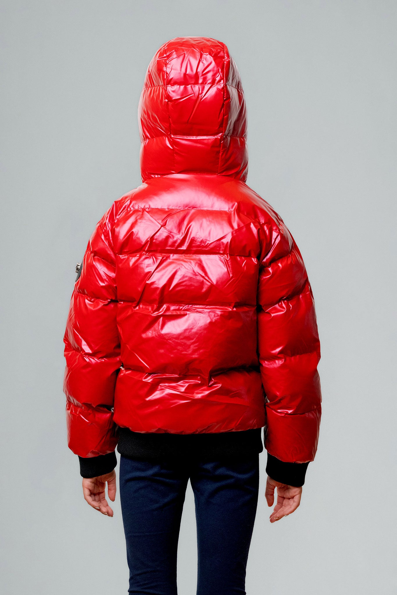 Woodpecker Kids' Chickadee Winter coat. High-end Canadian designer winter coat for Kids in "Raspberry" colour. Woodpecker cruelty-free winter coat designed in Canada. Kids' heavy weight short length premium designer jacket for winter. Superior quality warm winter coat for kids. Moose Knuckles, Canada Goose, Mackage, Montcler, Will Poho, Willbird, Nic Bayley. Extra warm. Shiny parka. Stylish winter jacket. Designer winter coat.