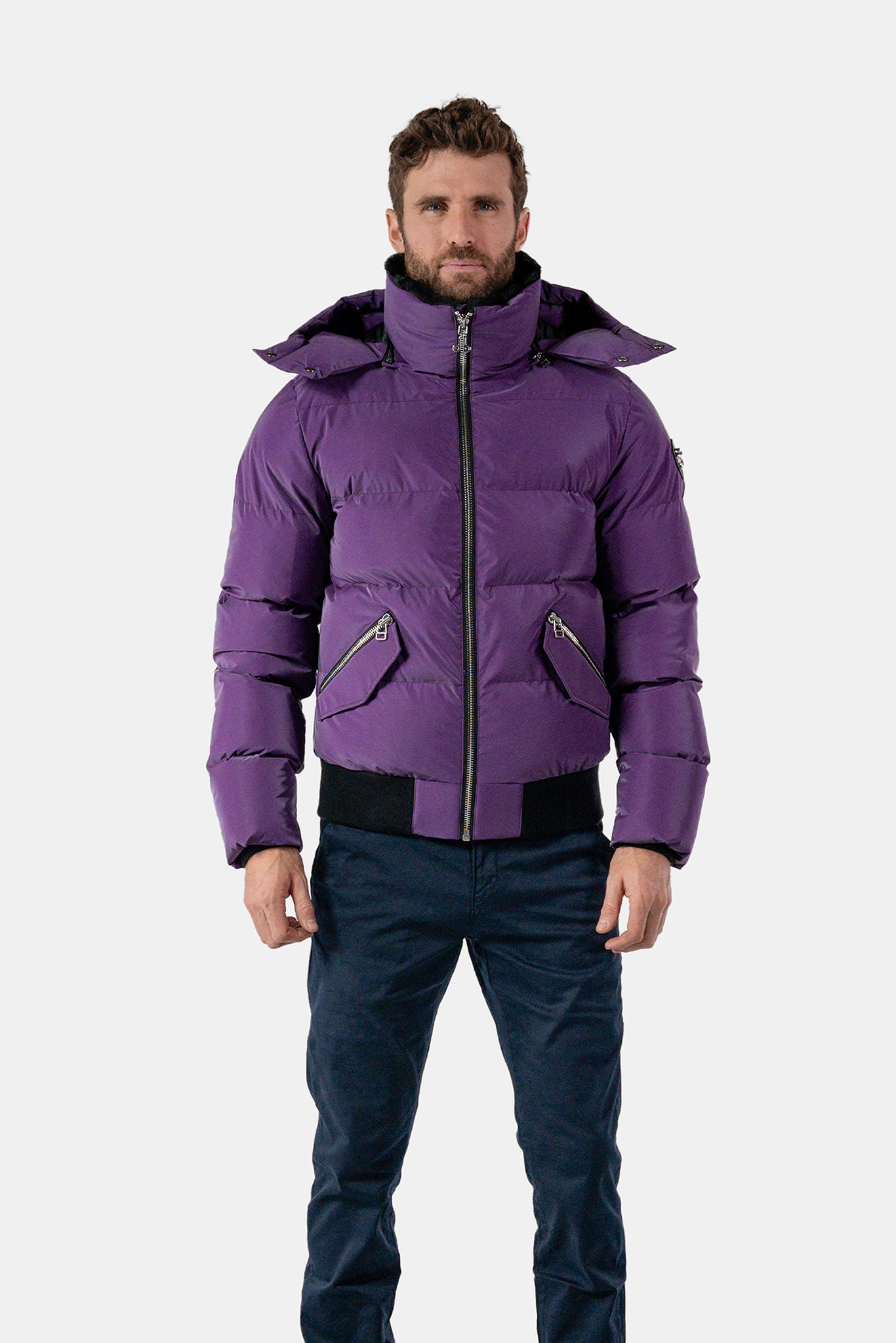 Woodpecker Men's Woody Bomber Winter coat. High-end Canadian designer winter coat for men in "Purple Diamond" colour. Woodpecker cruelty-free winter coat designed in Canada. Men's heavy weight short length premium designer jacket for winter. Superior quality warm winter coat for men. Moose Knuckles, Canada Goose, Mackage, Montcler, Will Poho, Willbird, Nic Bayley. Shiny parka. Stylish winter jacket. Designer winter coat.