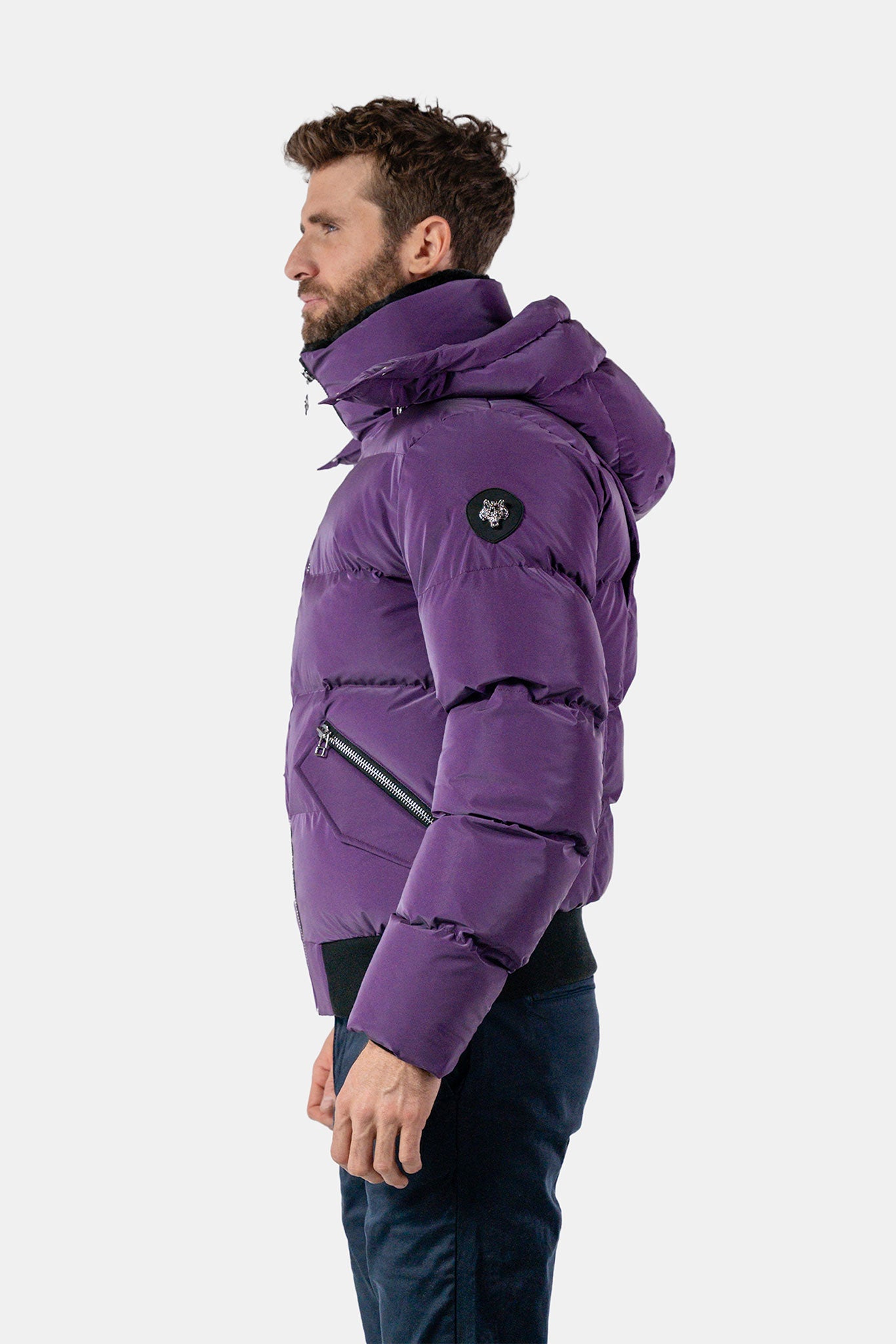 Woodpecker Men's Woody Bomber Winter coat. High-end Canadian designer winter coat for men in "Purple Diamond" colour. Woodpecker cruelty-free winter coat designed in Canada. Men's heavy weight short length premium designer jacket for winter. Superior quality warm winter coat for men. Moose Knuckles, Canada Goose, Mackage, Montcler, Will Poho, Willbird, Nic Bayley. Shiny parka. Stylish winter jacket. Designer winter coat.