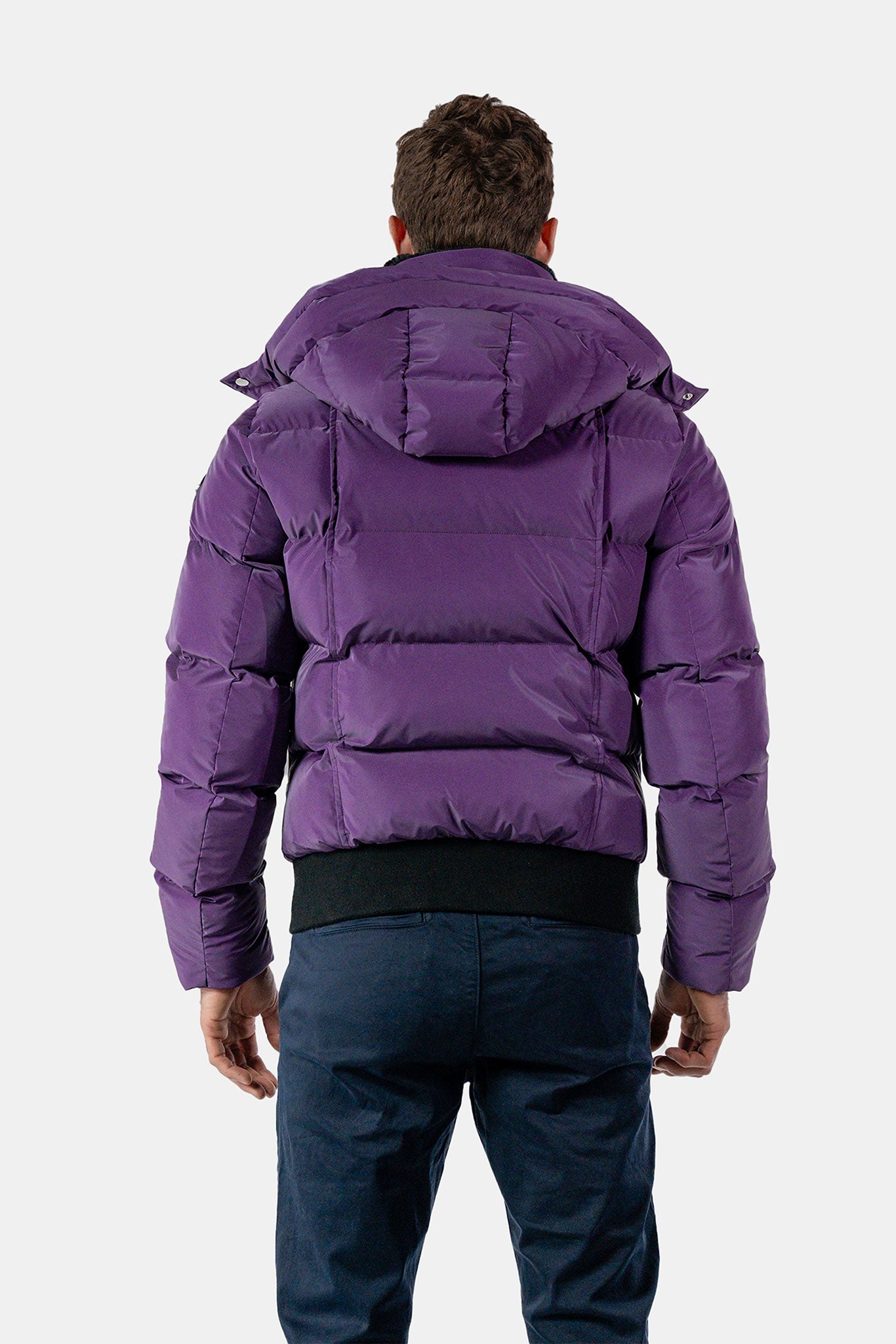 Woodpecker Men's Woody Bomber Winter coat. High-end Canadian designer winter coat for men in "Purple Diamond" colour. Woodpecker cruelty-free winter coat designed in Canada. Men's heavy weight short length premium designer jacket for winter. Superior quality warm winter coat for men. Moose Knuckles, Canada Goose, Mackage, Montcler, Will Poho, Willbird, Nic Bayley. Shiny parka. Stylish winter jacket. Designer winter coat.