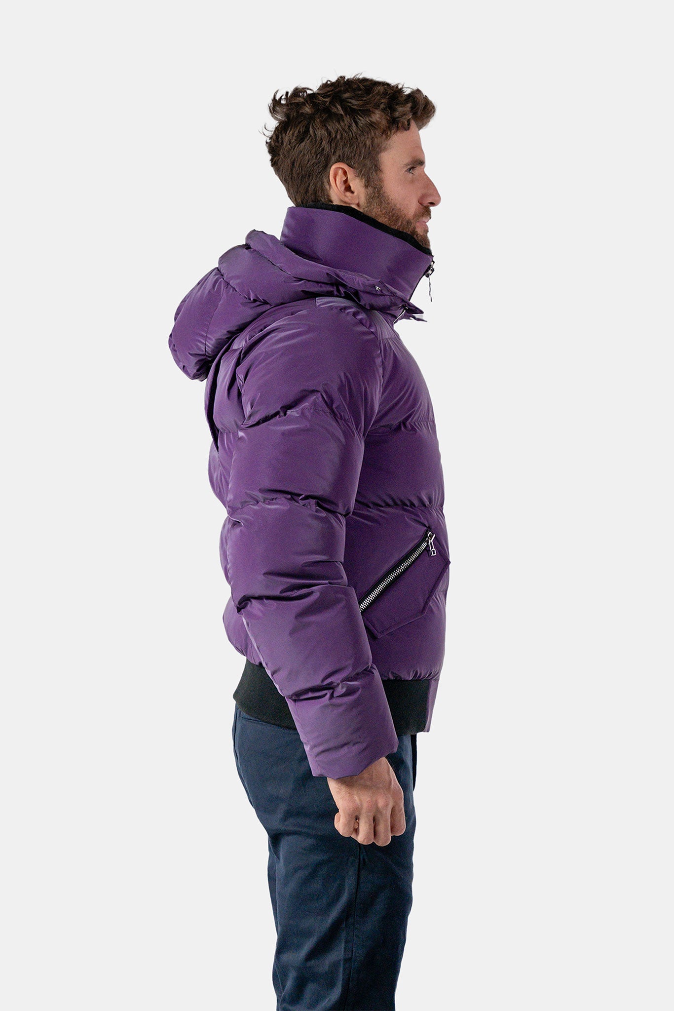 Woodpecker Men's Woody Bomber Winter coat. High-end Canadian designer winter coat for men in "Purple Diamond" colour. Woodpecker cruelty-free winter coat designed in Canada. Men's heavy weight short length premium designer jacket for winter. Superior quality warm winter coat for men. Moose Knuckles, Canada Goose, Mackage, Montcler, Will Poho, Willbird, Nic Bayley. Shiny parka. Stylish winter jacket. Designer winter coat.