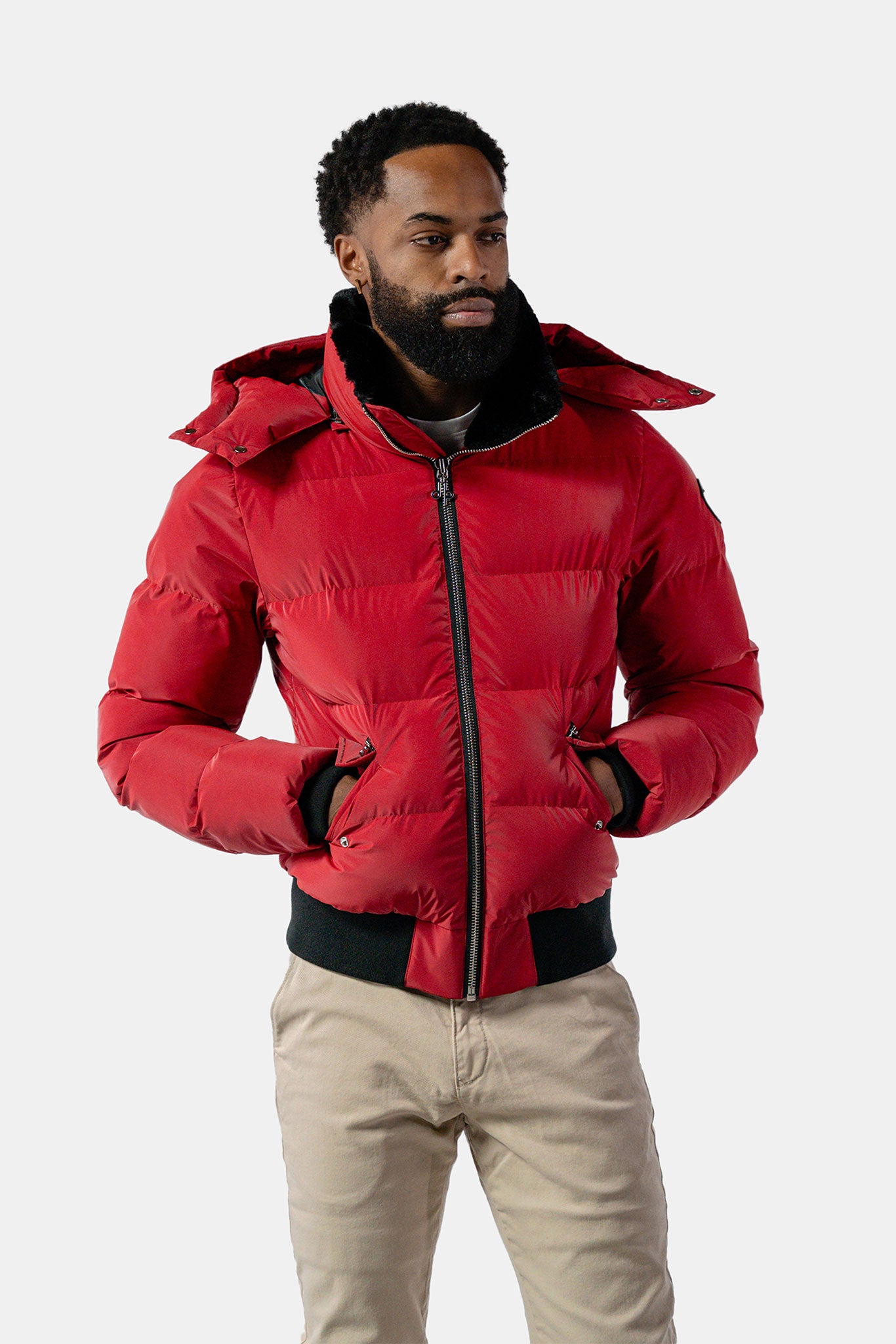 Woodpecker Men's Woody Bomber Winter coat. High-end Canadian designer winter coat for men in "Red Diamond" colour. Woodpecker cruelty-free winter coat designed in Canada. Men's heavy weight short length premium designer jacket for winter. Superior quality warm winter coat for men. Moose Knuckles, Canada Goose, Mackage, Montcler, Will Poho, Willbird, Nic Bayley. Shiny parka. Stylish winter jacket. Designer winter coat.