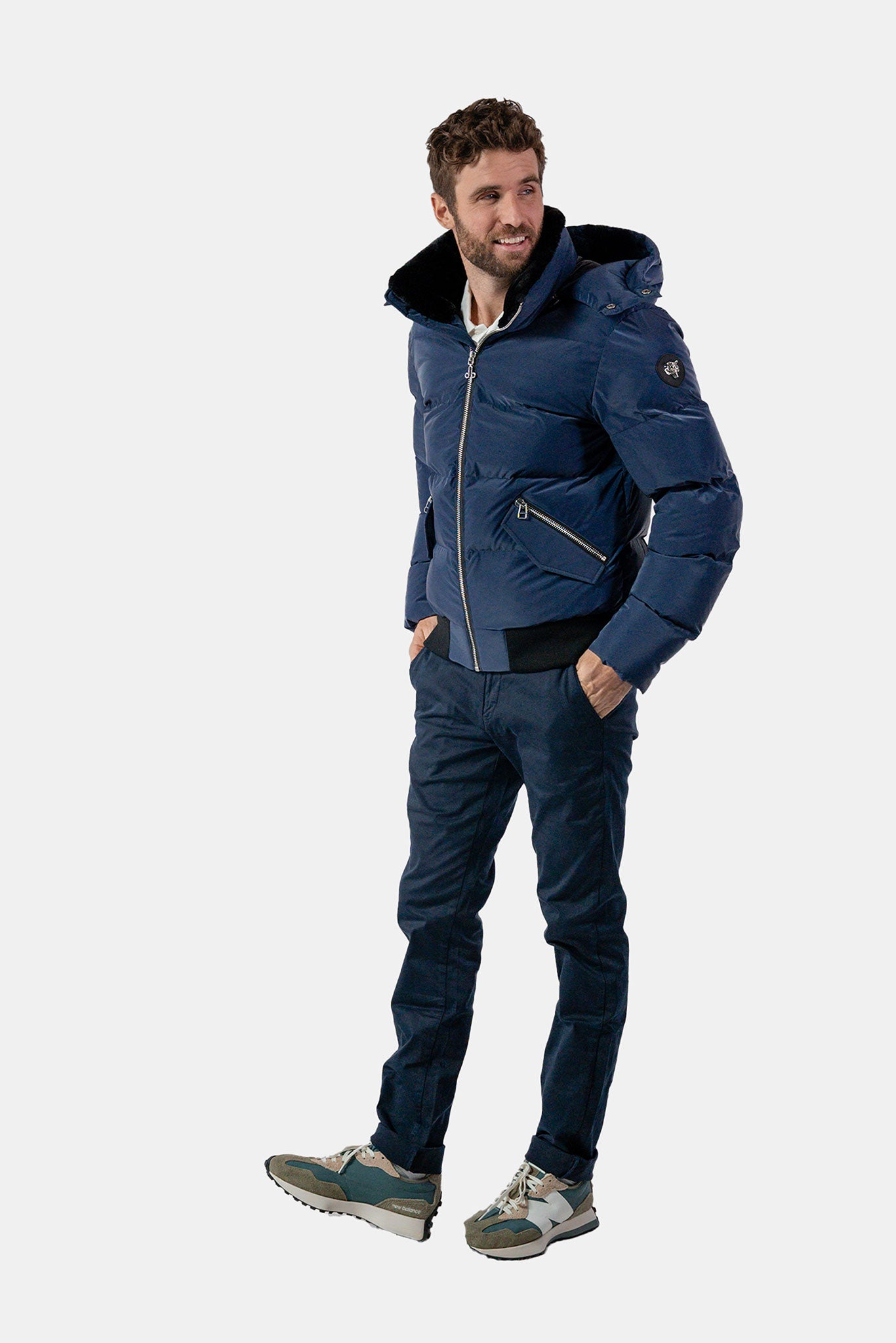 Woodpecker Men&#39;s Woody Bomber Winter coat. High-end Canadian designer winter coat for men in &quot;Sapphire Diamond&quot; colour. Woodpecker cruelty-free winter coat designed in Canada. Men&#39;s heavy weight short length premium designer jacket for winter. Superior quality warm winter coat for men. Moose Knuckles, Canada Goose, Mackage, Montcler, Will Poho, Willbird, Nic Bayley. Shiny parka. Stylish winter jacket. Designer winter coat.