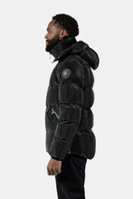 Load image into Gallery viewer, Woodpecker Men&#39;s Bumnester Bomber Winter coat. High-end Canadian designer winter coat for men in &quot;Black Diamond&quot; colour. Woodpecker cruelty-free winter coat designed in Canada. Men&#39;s heavy weight medium length premium designer jacket for winter. Superior quality warm winter coat for men. Moose Knuckles, Canada Goose, Mackage, Montcler, Will Poho, Willbird, Nic Bayley. Shiny parka. Stylish winter jacket. Designer winter coat.
