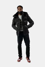 Load image into Gallery viewer, Woodpecker Men&#39;s Bumnester Bomber Winter coat. High-end Canadian designer winter coat for men in &quot;Black Diamond&quot; colour. Woodpecker cruelty-free winter coat designed in Canada. Men&#39;s heavy weight medium length premium designer jacket for winter. Superior quality warm winter coat for men. Moose Knuckles, Canada Goose, Mackage, Montcler, Will Poho, Willbird, Nic Bayley. Shiny parka. Stylish winter jacket. Designer winter coat.
