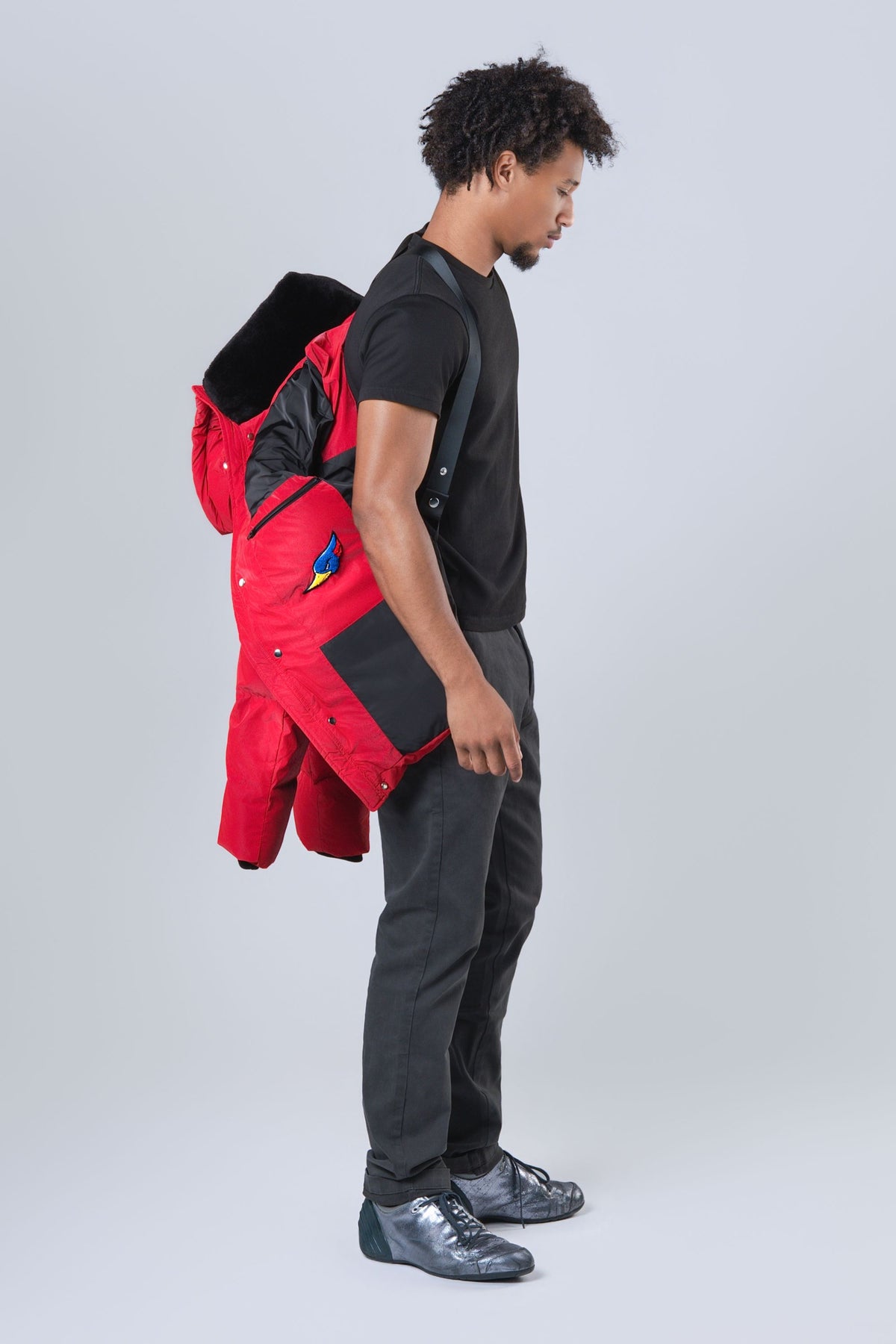 Backpack carrying straps on the men's Bumnester 3/4 winter coat in Red Diamond
