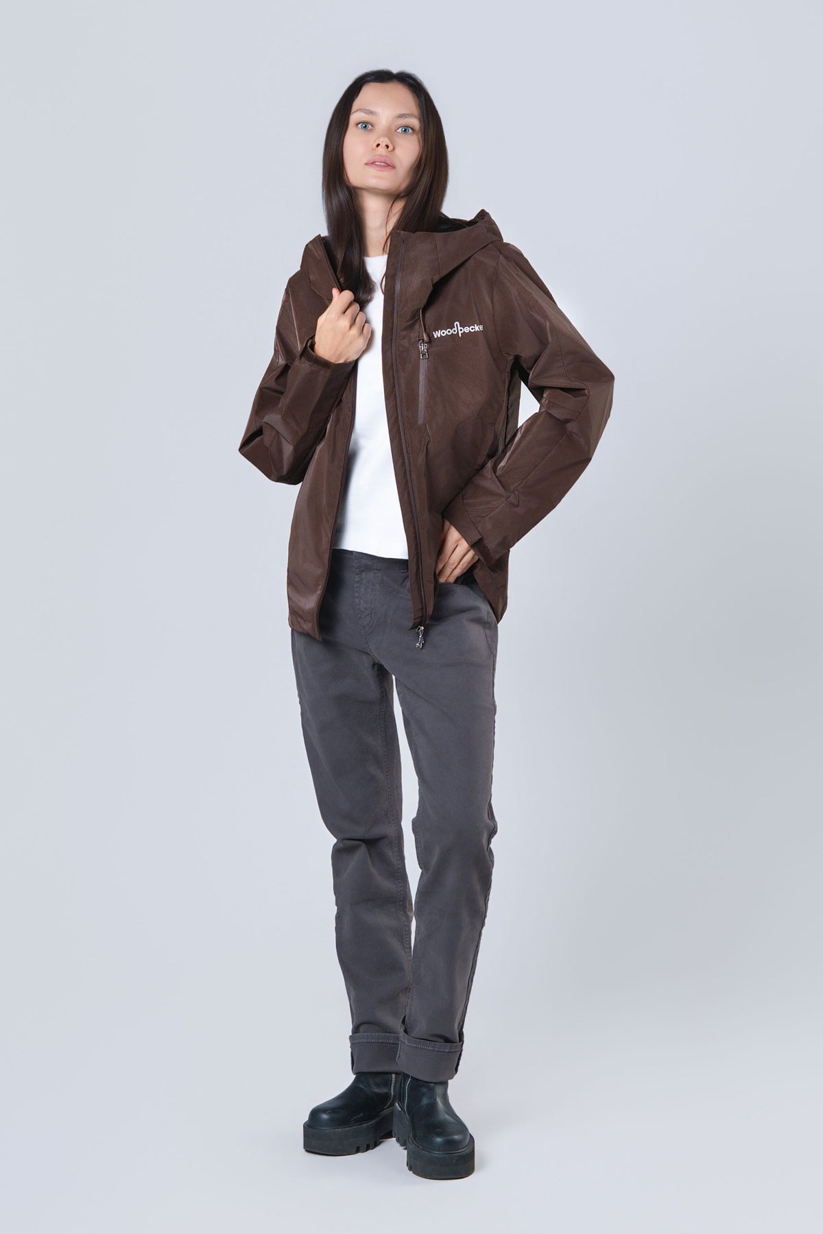 Woman wearing the wind shell windbreaker jacket in Mocha Diamond