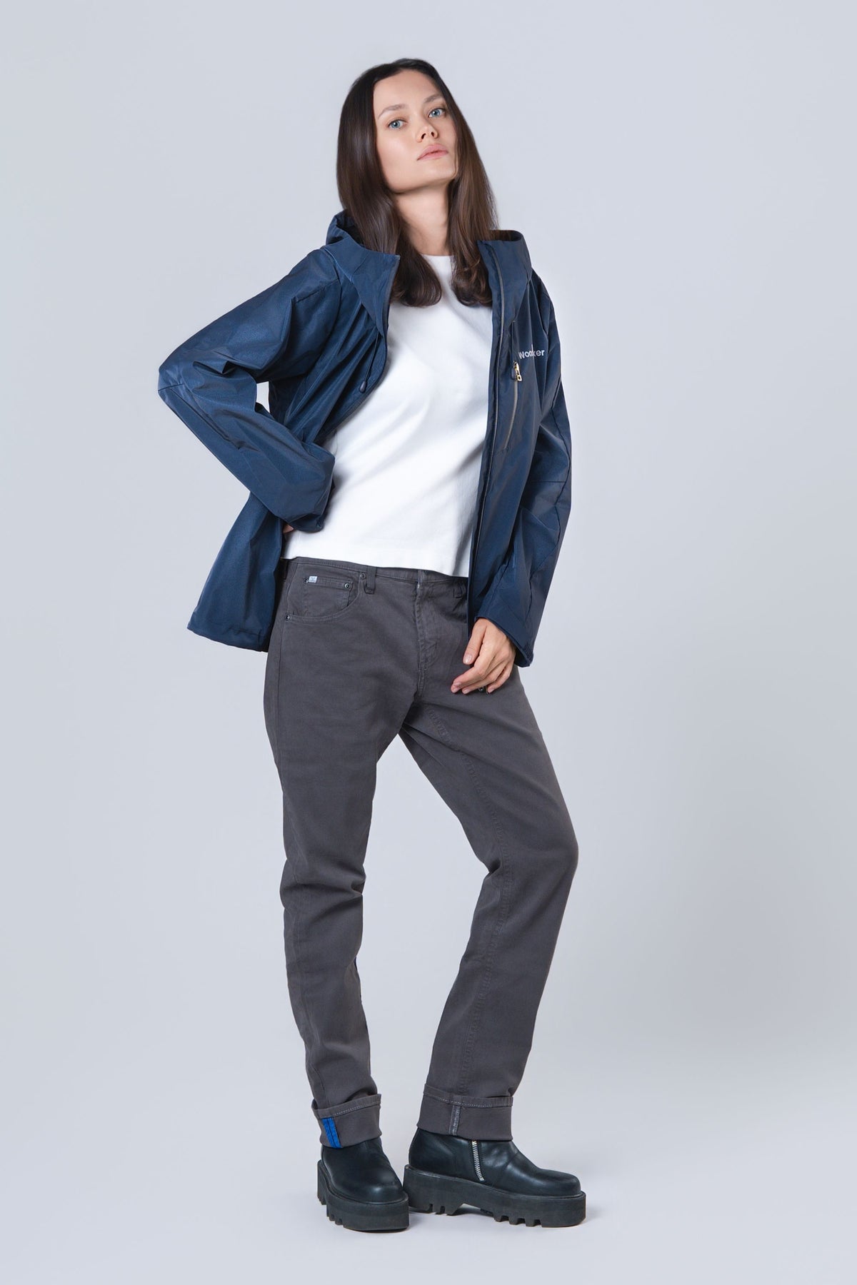 Woman wearing the wind shell windbreaker jacket in Sapphire Diamond