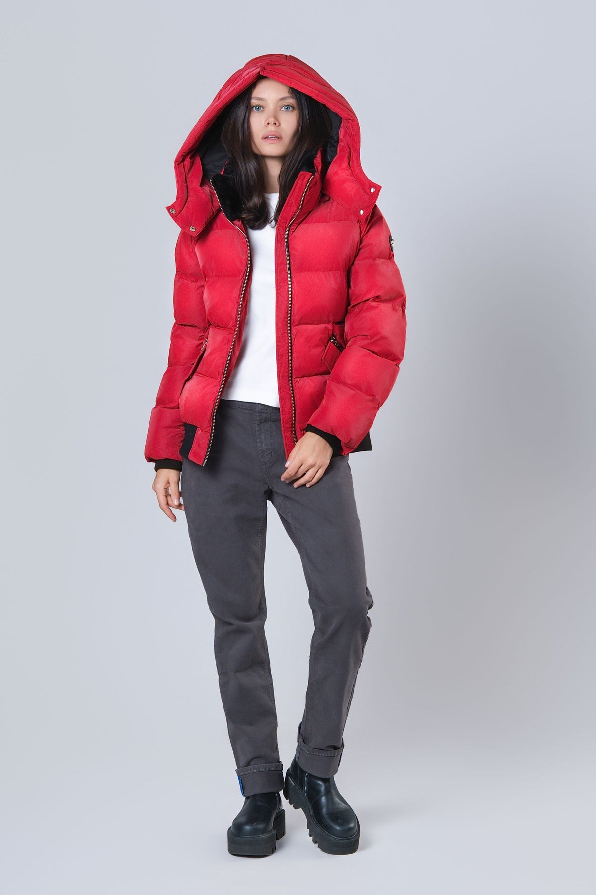 Woman wearing the Woody bomber winter jacket in Red Diamond