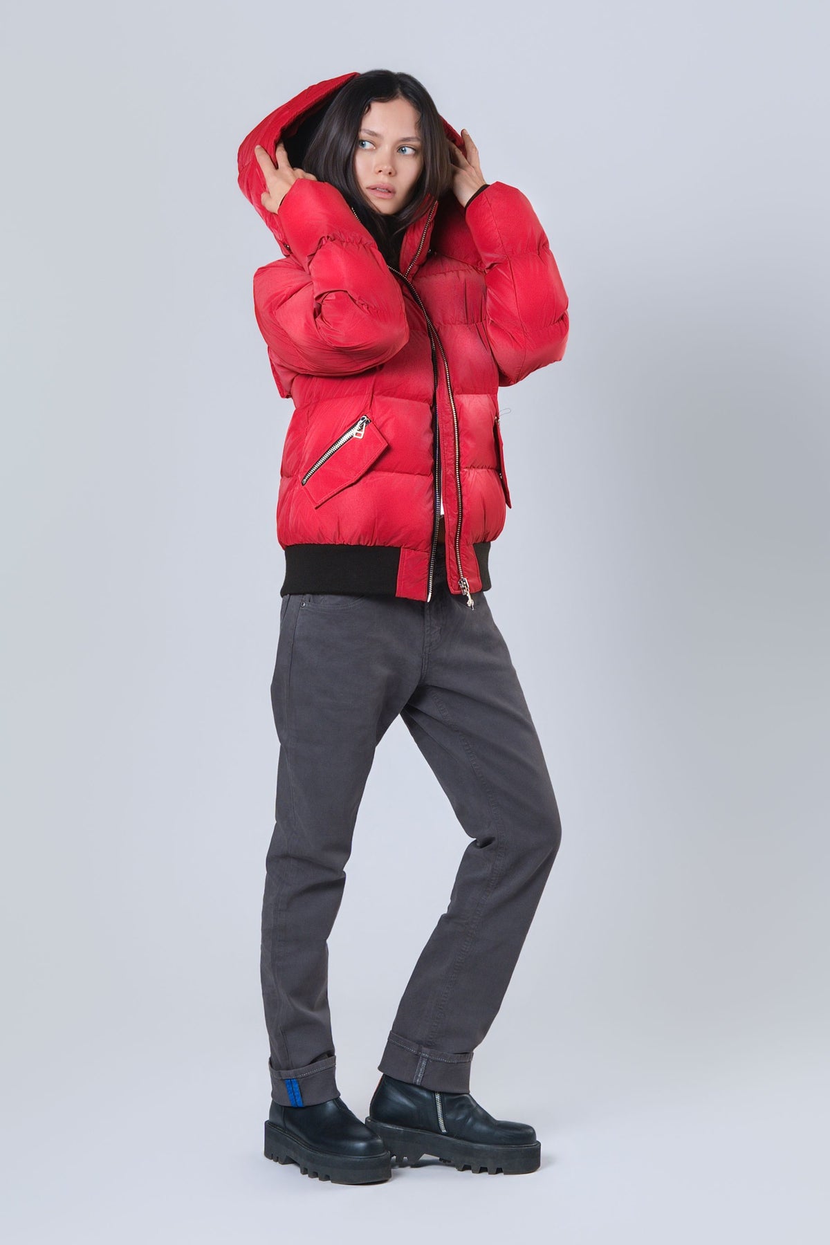 Woman wearing the Woody bomber winter jacket in Red Diamond