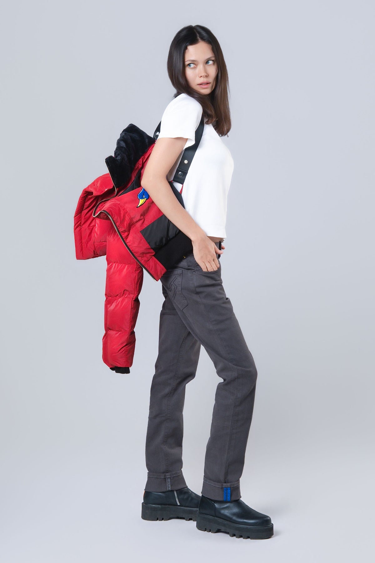 Woman wearing the Woody bomber winter jacket in Red Diamond