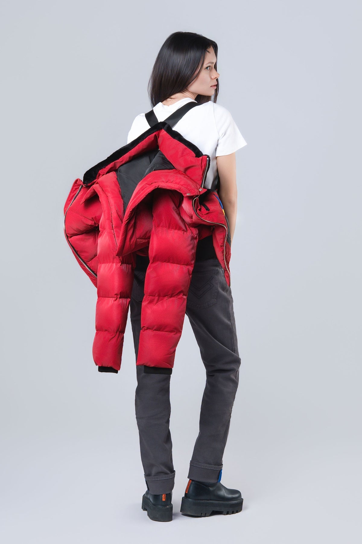 Woman wearing the Woody bomber winter jacket in Red Diamond