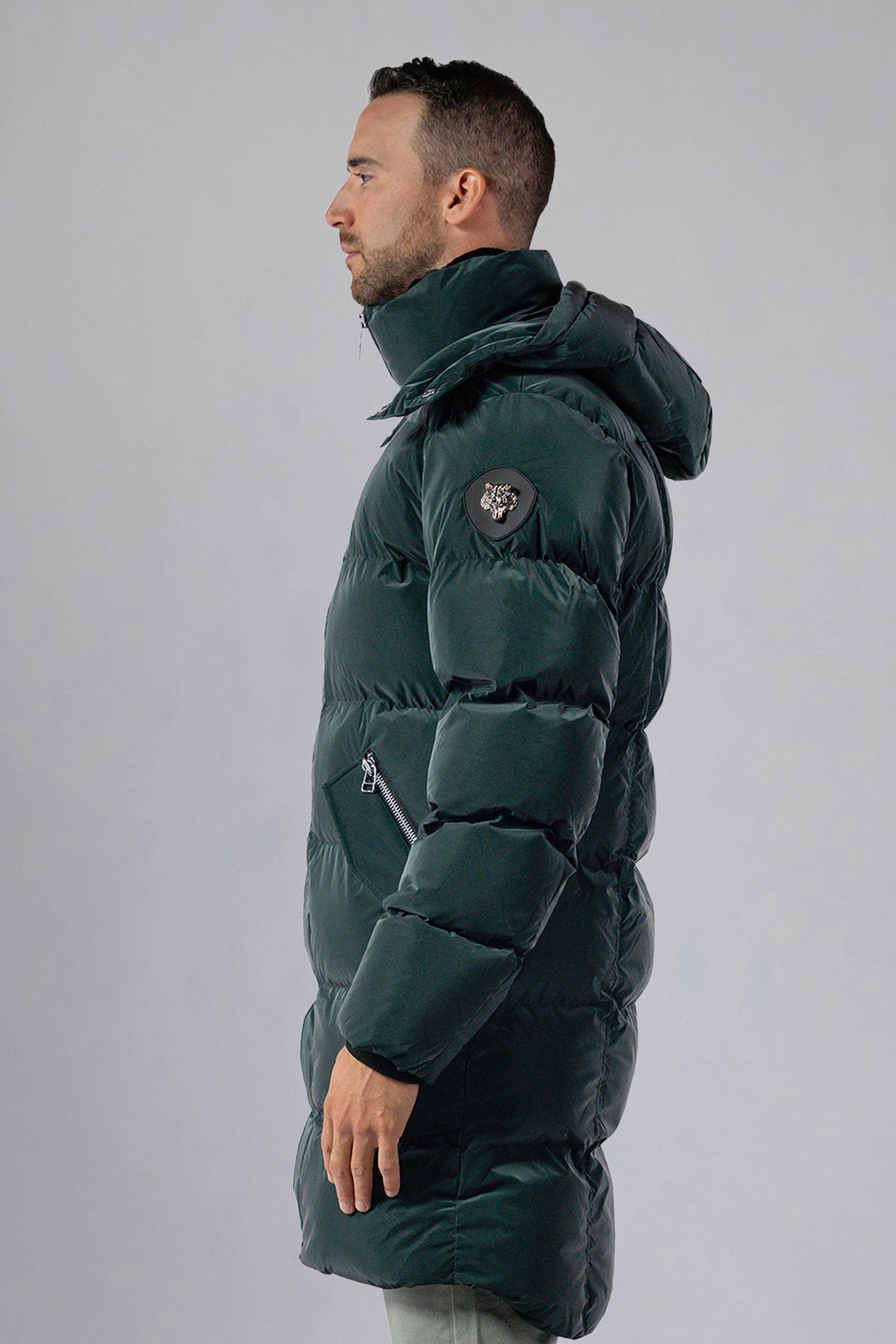 Woodpecker Men's Penguin Long Winter coat. High-end Canadian designer winter coat for men in "Green Diamond" navy blue colour. Woodpecker cruelty-free winter coat designed in Canada. Men's heavy weight long length premium designer jacket for winter. Superior quality warm winter coat for men. Moose Knuckles, Canada Goose, Mackage, Montcler, Will Poho, Willbird, Nic Bayley