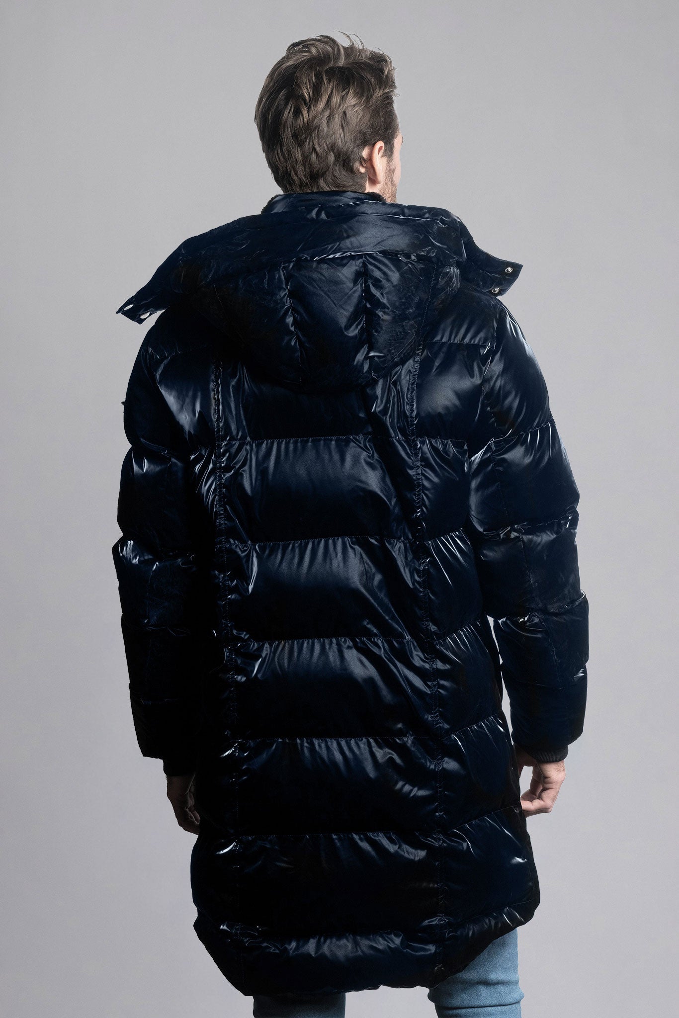 Woodpecker Men's Penguin Long Winter coat. High-end Canadian designer winter coat for men in shiny "All Wet Blue" navy blue colour. Woodpecker cruelty-free winter coat designed in Canada. Men's heavy weight long length premium designer jacket for winter. Superior quality warm winter coat for men. Moose Knuckles, Canada Goose, Mackage, Montcler, Will Poho, Willbird, Nic Bayley