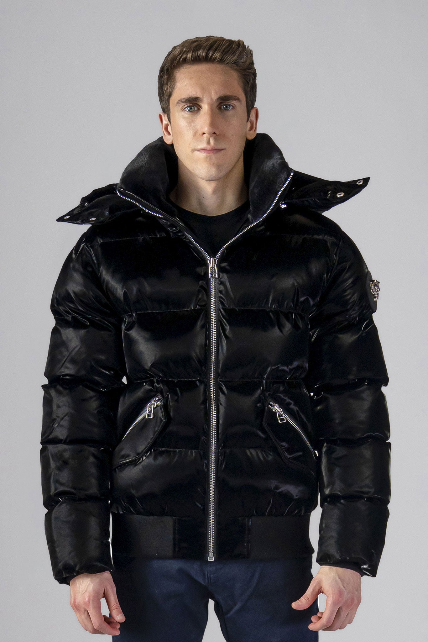 Woodpecker Men's Woody Bomber Winter coat. High-end Canadian designer winter coat for men in shiny “All Wet Black