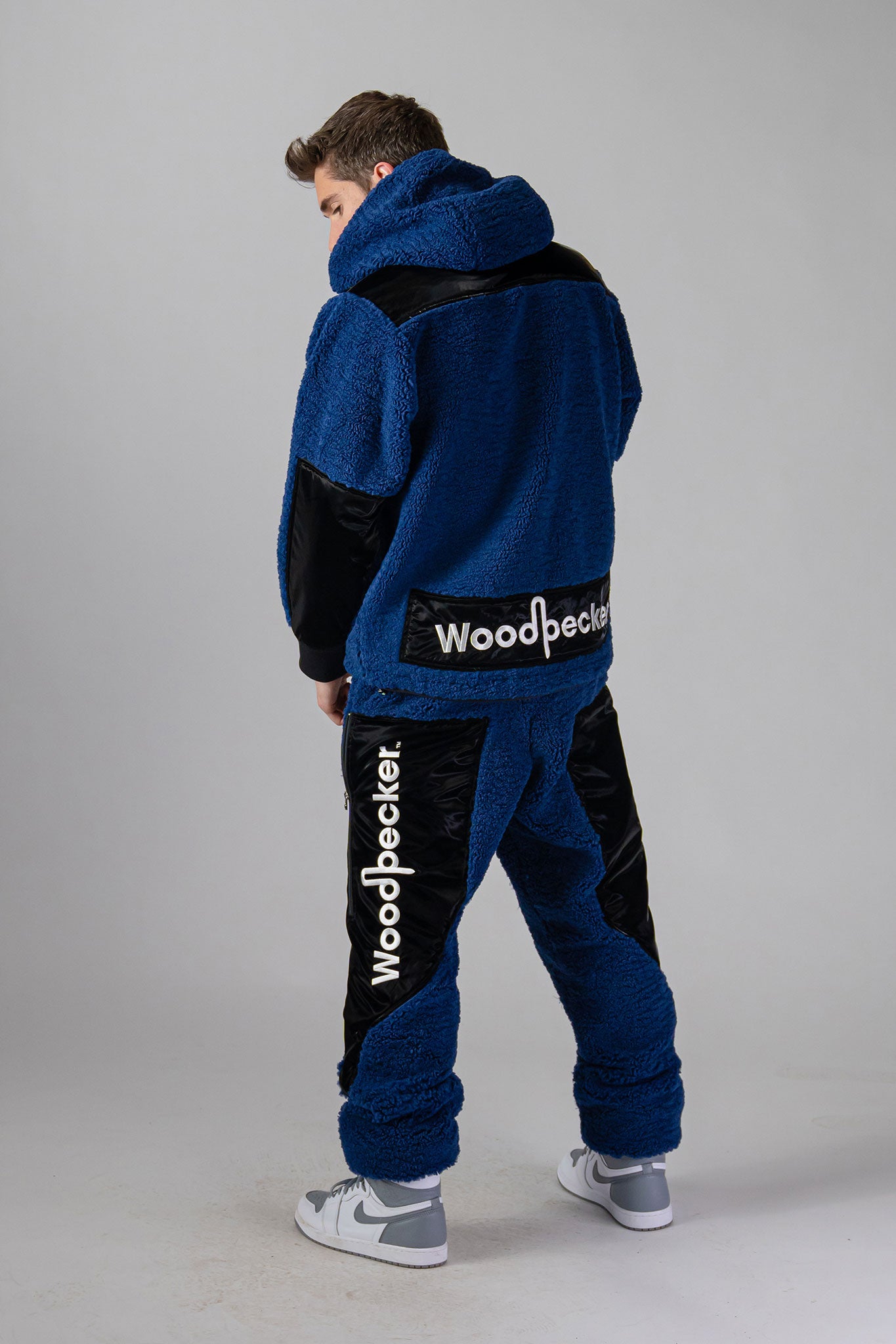 Woodpecker Unisex Fleece Hoodie. High-end Canadian designer winter fleece in "Navy" colour. Woodpecker fleece designed in Canada. Warm premium designer fleece for winter. Superior quality warm fleece hoodie. Moose Knuckles, Canada Goose, Mackage, Montcler, Will Poho, Willbird, Nic Bayley. Cozy for at-home wear.