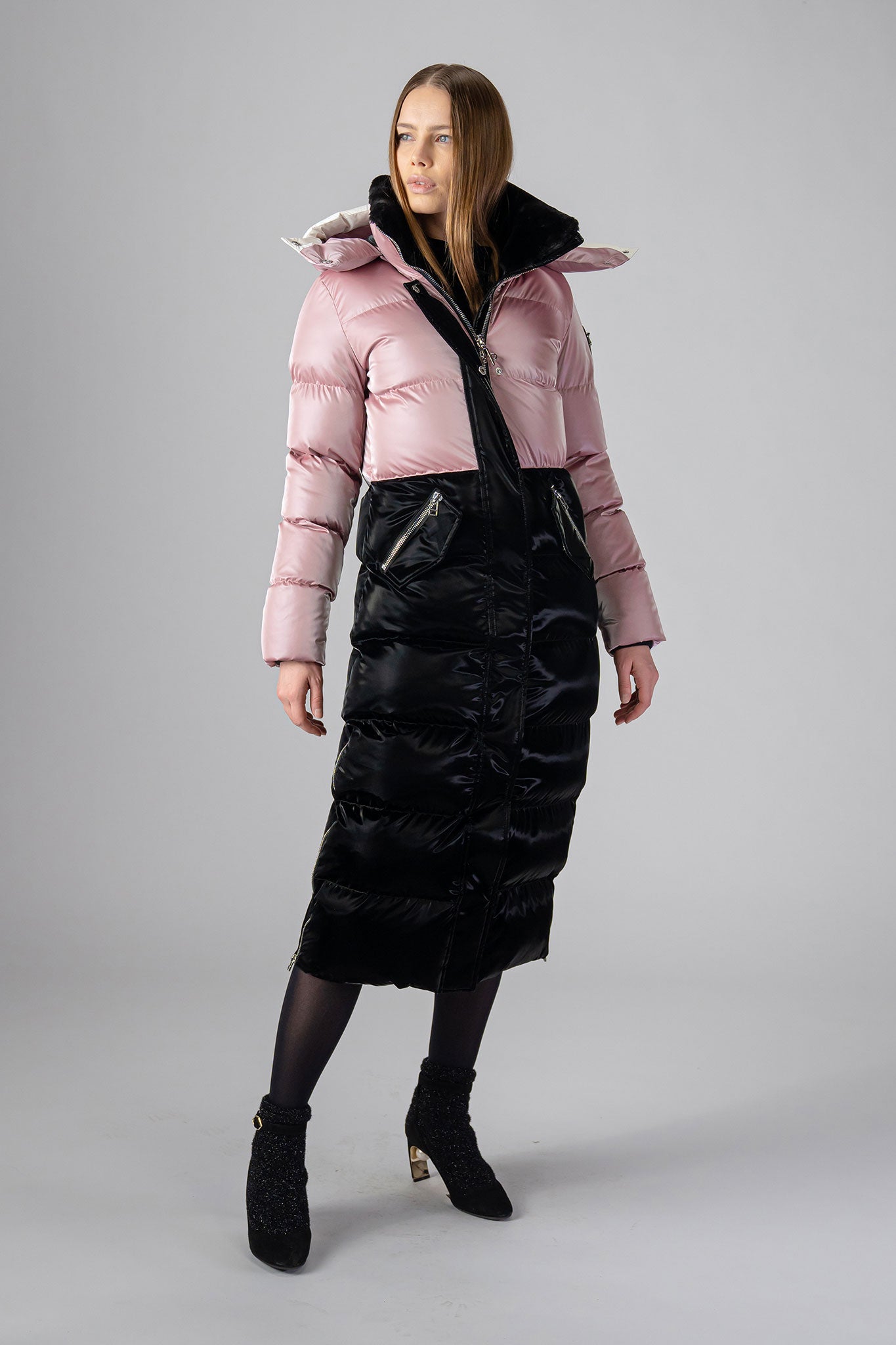 Woodpecker Women's Extra Long Bird of Paradise Winter coat. High-end Canadian designer winter coat for women in “Arctic Rose and Black" colour. Woodpecker cruelty-free winter coat designed in Canada. Women's heavy weight extra long length premium designer jacket for winter. Superior quality warm winter coat for women. Moose Knuckles, Canada Goose, Mackage, Montcler, Will Poho, Willbird, Nic Bayley. Extra warm. Shiny parka. Stylish winter jacket. Designer winter coat.