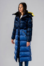 Load image into Gallery viewer, Woodpecker Women&#39;s Extra Long Bird of Paradise Winter coat. High-end Canadian designer winter coat for women in “Blue Yellow&quot; colour. Woodpecker cruelty-free winter coat designed in Canada. Women&#39;s heavy weight extra long length premium designer jacket for winter. Superior quality warm winter coat for women. Moose Knuckles, Canada Goose, Mackage, Montcler, Will Poho, Willbird, Nic Bayley. Extra warm. Shiny parka. Stylish winter jacket. Designer winter coat.
