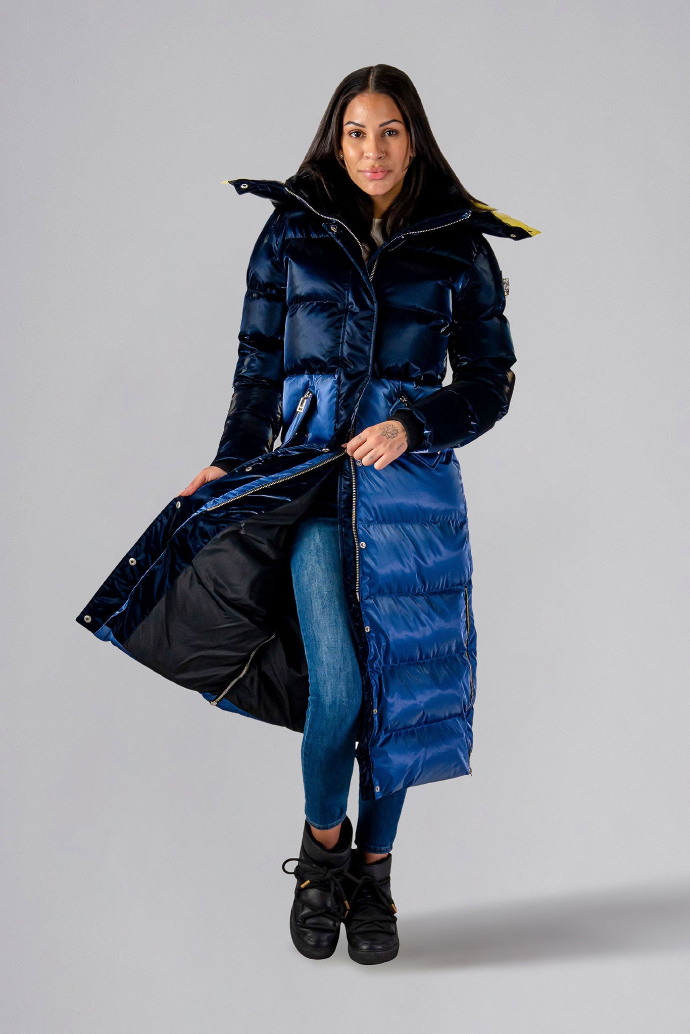 Woodpecker Women&#39;s Extra Long Bird of Paradise Winter coat. High-end Canadian designer winter coat for women in “Blue Yellow&quot; colour. Woodpecker cruelty-free winter coat designed in Canada. Women&#39;s heavy weight extra long length premium designer jacket for winter. Superior quality warm winter coat for women. Moose Knuckles, Canada Goose, Mackage, Montcler, Will Poho, Willbird, Nic Bayley. Extra warm. Shiny parka. Stylish winter jacket. Designer winter coat.