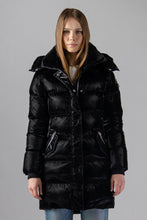 Load image into Gallery viewer, Woodpecker Women&#39;s Penguin Long Winter coat. High-end Canadian designer winter coat for women in &quot;All Wet Black&quot; colour. Woodpecker cruelty-free winter coat designed in Canada. Women&#39;s heavy weight long length premium designer jacket for winter. Superior quality warm winter coat for women. Moose Knuckles, Canada Goose, Mackage, Montcler, Will Poho, Willbird, Nic Bayley. Extra warm. Shiny parka. Stylish winter jacket. Designer winter coat.
