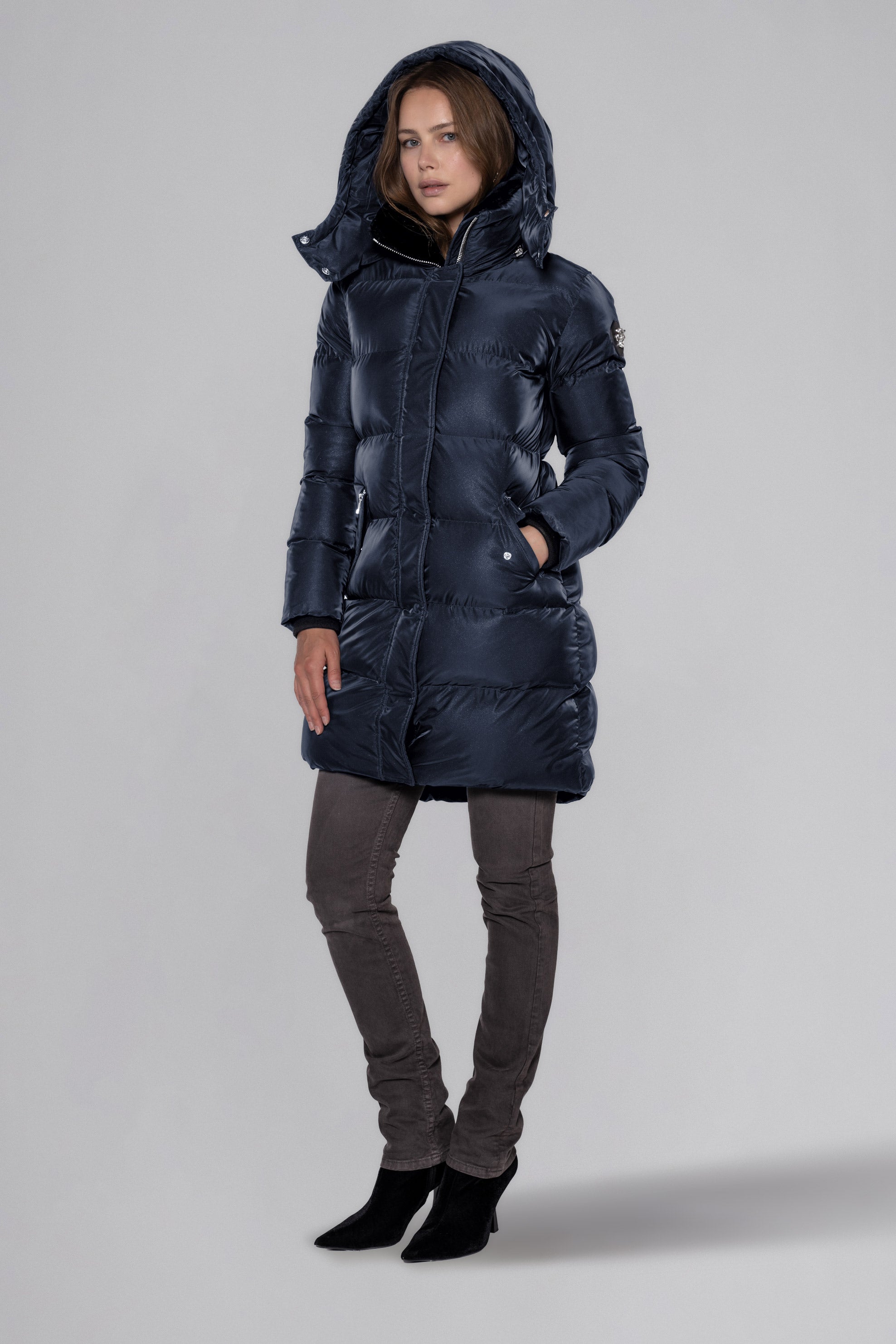 Woodpecker Women's Penguin Long Winter coat. High-end Canadian designer winter coat for women in "Blue Diamond" colour. Woodpecker cruelty-free winter coat designed in Canada. Women's heavy weight long length premium designer jacket for winter. Superior quality warm winter coat for women. Moose Knuckles, Canada Goose, Mackage, Montcler, Will Poho, Willbird, Nic Bayley