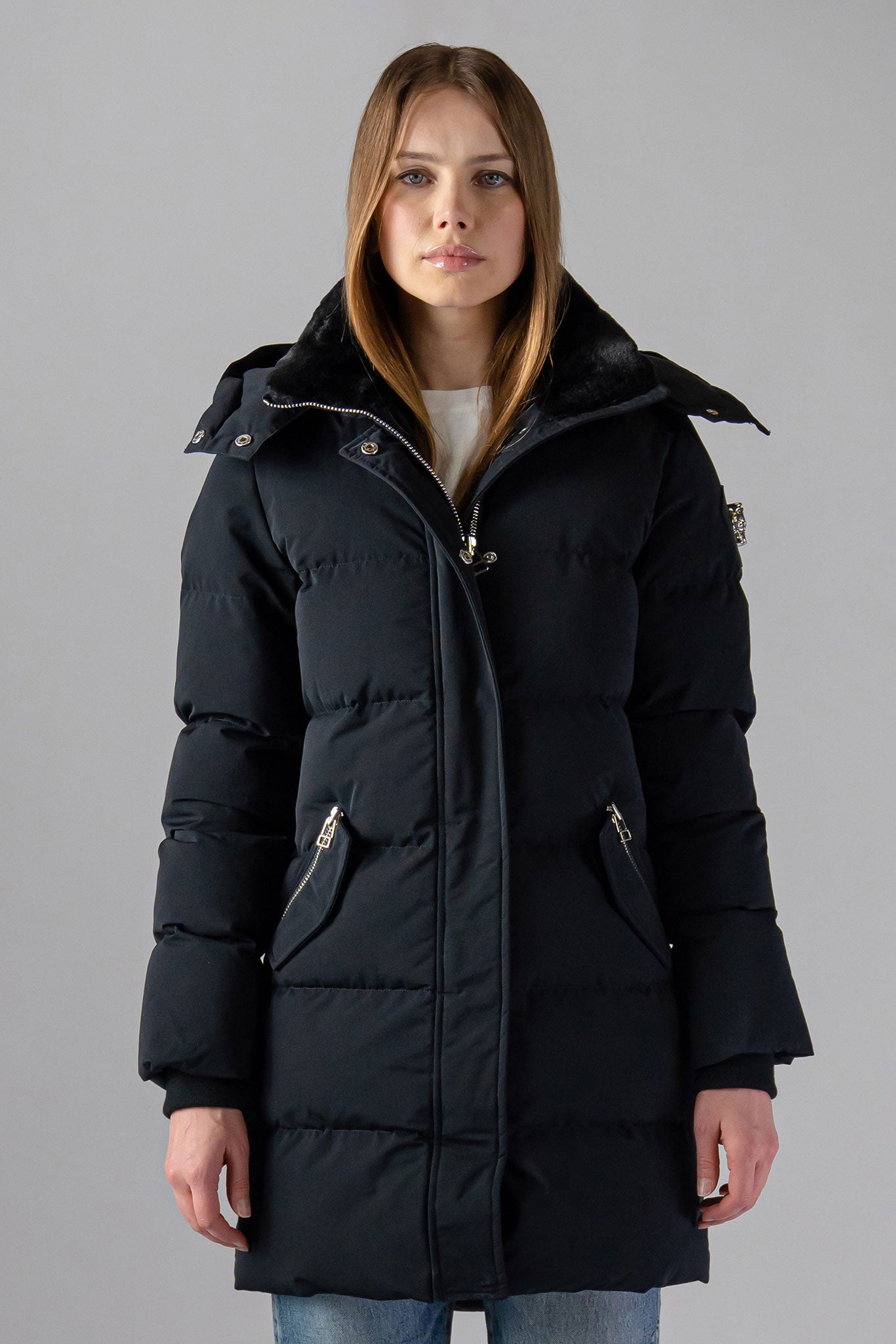 Woodpecker Women&#39;s Penguin Long Winter coat. High-end Canadian designer winter coat for women in &quot;Matte Black&quot; colour. Woodpecker cruelty-free winter coat designed in Canada. Women&#39;s heavy weight long length premium designer jacket for winter. Superior quality warm winter coat for women. Moose Knuckles, Canada Goose, Mackage, Montcler, Will Poho, Willbird, Nic Bayley. Extra warm. Shiny parka. Stylish winter jacket. Designer winter coat.