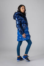 Load image into Gallery viewer, Woodpecker Women&#39;s Penguin Long Winter coat. High-end Canadian designer winter coat for women in &quot;Oily Blue Blue&quot; colour. Woodpecker cruelty-free winter coat designed in Canada. Women&#39;s heavy weight long length premium designer jacket for winter. Superior quality warm winter coat for women. Moose Knuckles, Canada Goose, Mackage, Montcler, Will Poho, Willbird, Nic Bayley. Extra warm. Shiny parka. Stylish winter jacket. Designer winter coat.
