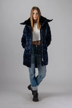 Load image into Gallery viewer, Woodpecker Women&#39;s Unquilted Penguin Long Winter coat. High-end Canadian designer winter coat for women in &quot;All Wet Navy&quot; colour. Woodpecker cruelty-free winter coat designed in Canada. Women&#39;s heavy weight long length premium designer jacket for winter. Superior quality warm winter coat for women. Moose Knuckles, Canada Goose, Mackage, Montcler, Will Poho, Willbird, Nic Bayley. Extra warm. Shiny parka. Stylish winter jacket. Designer winter coat.
