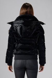Woodpecker Women's Woody Bomber Winter coat. High-end Canadian designer winter coat for women in shiny “All Wet Black". Woodpecker cruelty-free winter coat designed in Canada. Women's heavy weight short length premium designer jacket for winter. Superior quality warm winter coat for women. Moose Knuckles, Canada Goose, Mackage, Montcler, Will Poho, Willbird, Nic Bayley. Shiny parka. Stylish winter jacket. Designer winter coat.