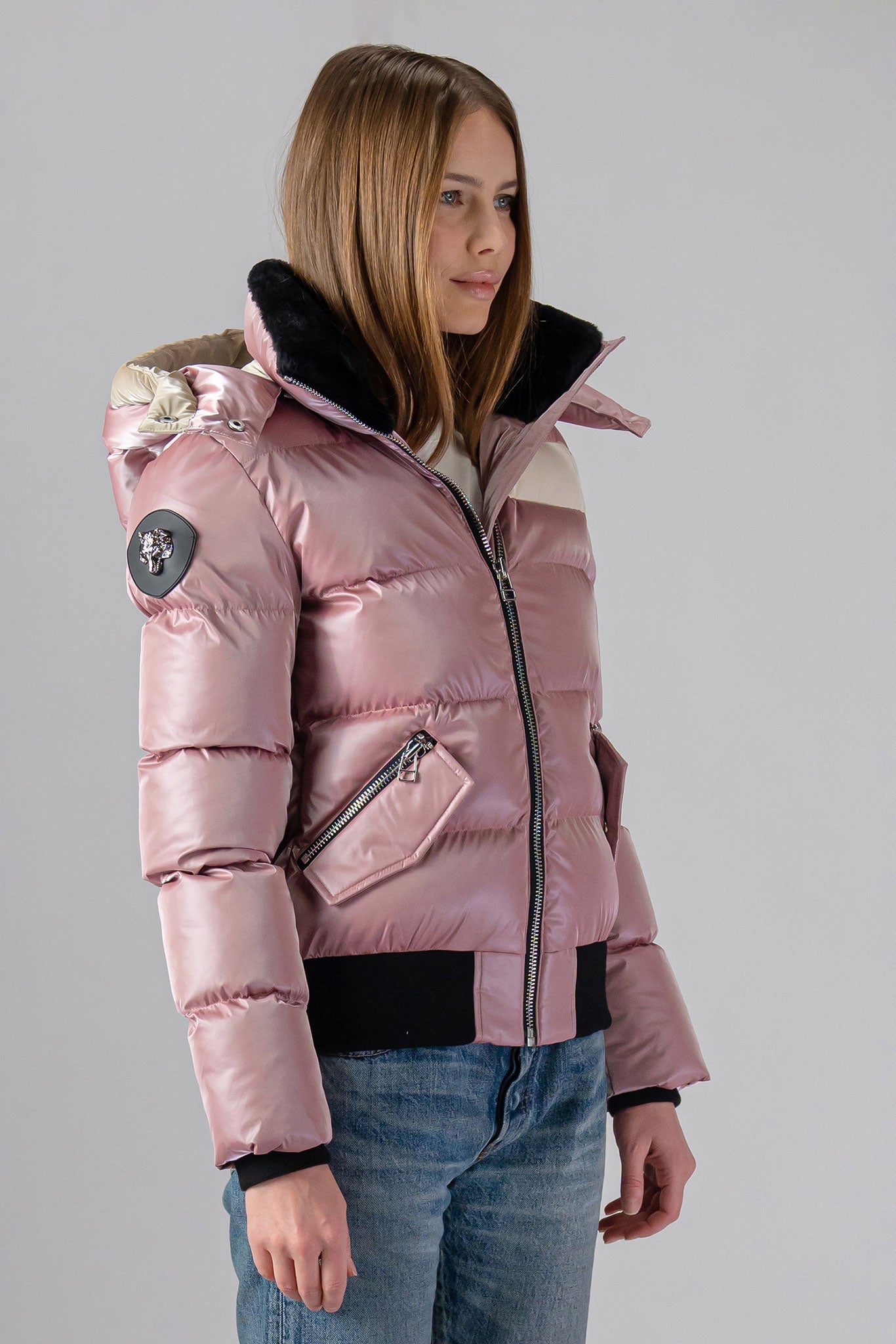 Woodpecker Women&#39;s Woody Bomber Winter coat. High-end Canadian designer winter coat for women in “Arctic Rose&quot; colour. Woodpecker cruelty-free winter coat designed in Canada. Women&#39;s heavy weight short length premium designer jacket for winter. Superior quality warm winter coat for women. Moose Knuckles, Canada Goose, Mackage, Montcler, Will Poho, Willbird, Nic Bayley. Shiny parka. Stylish winter jacket. Designer winter coat.