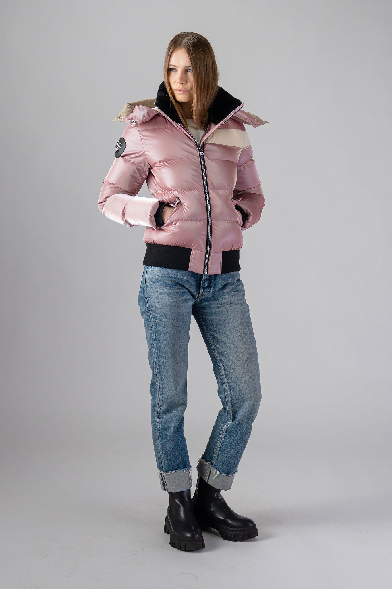 Woodpecker Women&#39;s Woody Bomber Winter coat. High-end Canadian designer winter coat for women in “Arctic Rose&quot; colour. Woodpecker cruelty-free winter coat designed in Canada. Women&#39;s heavy weight short length premium designer jacket for winter. Superior quality warm winter coat for women. Moose Knuckles, Canada Goose, Mackage, Montcler, Will Poho, Willbird, Nic Bayley. Shiny parka. Stylish winter jacket. Designer winter coat.