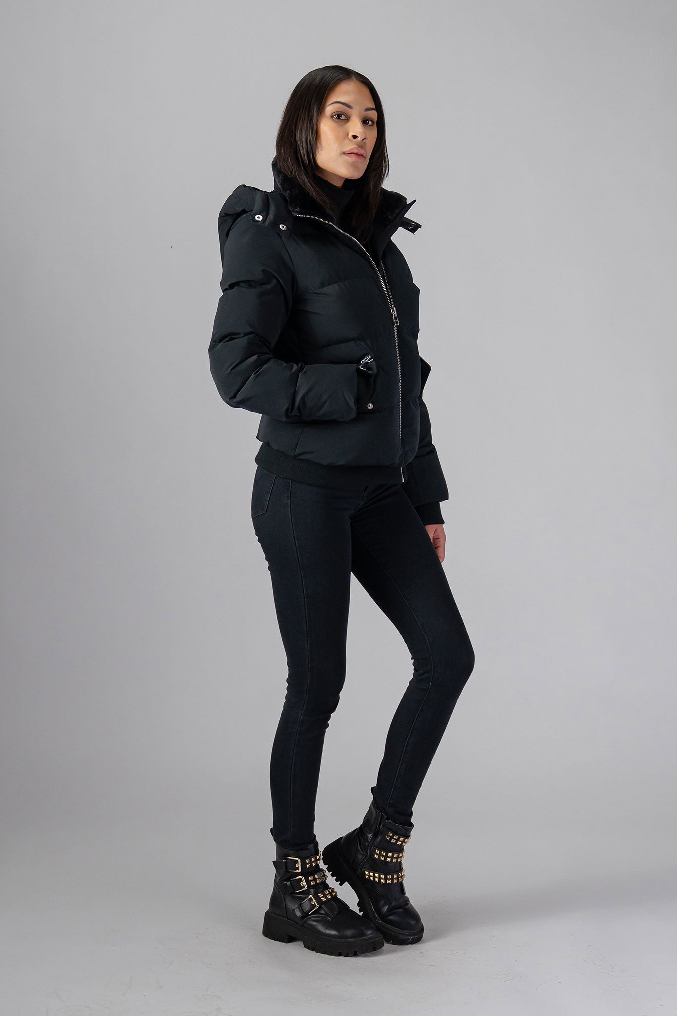 Woodpecker Women&#39;s Woody Bomber Winter coat. High-end Canadian designer winter coat for women in shiny “Matte Black&quot; colour. Woodpecker cruelty-free winter coat designed in Canada. Women&#39;s heavy weight short length premium designer jacket for winter. Superior quality warm winter coat for women. Moose Knuckles, Canada Goose, Mackage, Montcler, Will Poho, Willbird, Nic Bayley. Shiny parka. Stylish winter jacket. Designer winter coat.