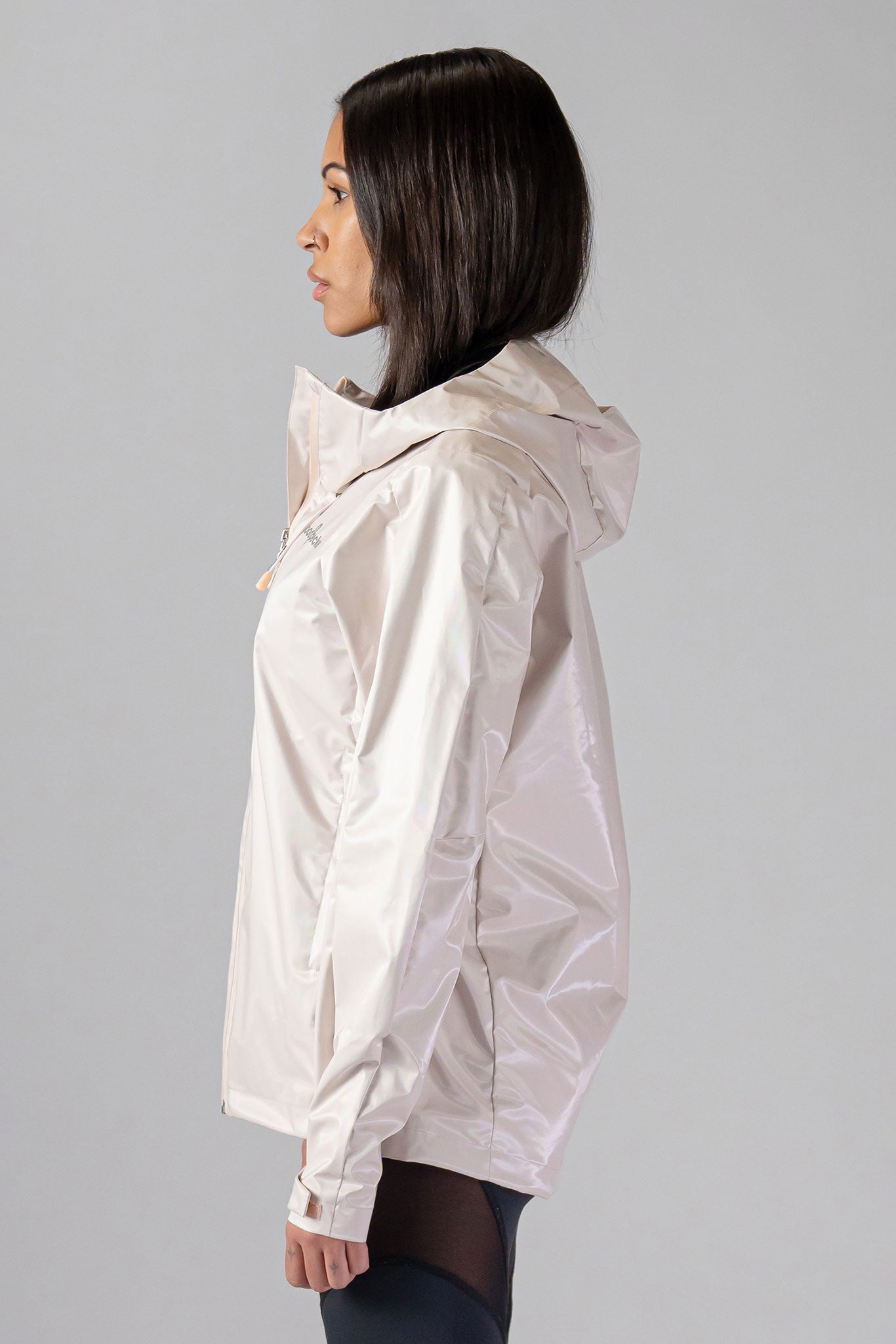 Woodpecker Women&#39;s Wind Shell coat. High-end Canadian designer activewear coat for women in &quot;Flamingo&quot; colour. Woodpecker coat designed in Canada. Moose Knuckles, Canada Goose, Mackage, Montcler, Will Poho, Willbird, Nic Bayley.