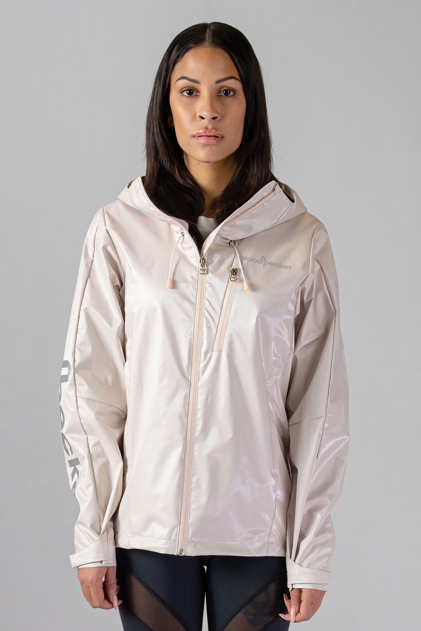 Woodpecker Women&#39;s Wind Shell coat. High-end Canadian designer activewear coat for women in &quot;Flamingo&quot; colour. Woodpecker coat designed in Canada. Moose Knuckles, Canada Goose, Mackage, Montcler, Will Poho, Willbird, Nic Bayley.