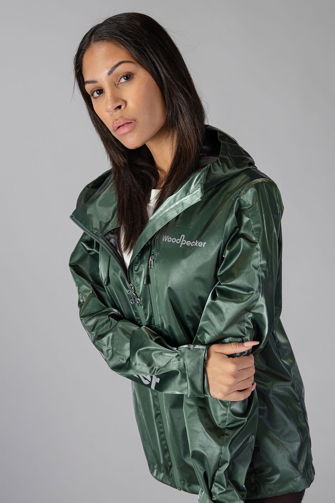 Woodpecker Women&#39;s Wind Shell coat. High-end Canadian designer activewear coat for women in &quot;Green Diamond&quot; colour. Woodpecker coat designed in Canada. Moose Knuckles, Canada Goose, Mackage, Montcler, Will Poho, Willbird, Nic Bayley.