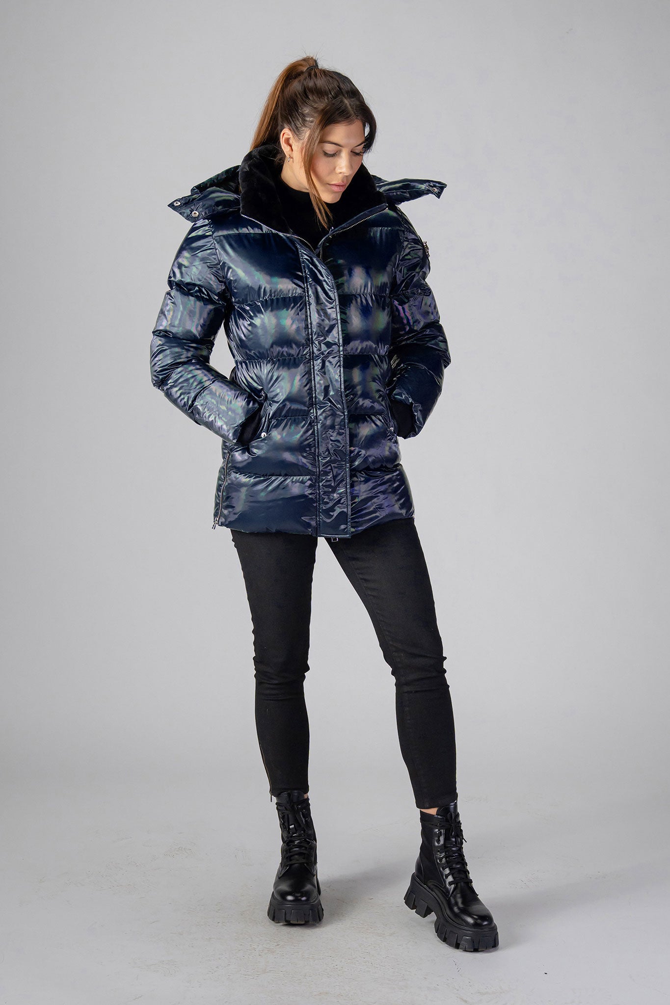 Woodpecker Women&#39;s Bumnester Winter coat. High-end Canadian designer winter coat for women in &quot;Oily Blue&quot; colour. Woodpecker cruelty-free winter coat designed in Canada. Women&#39;s heavy weight medium length premium designer jacket for winter. Superior quality warm winter coat for women. Moose Knuckles, Canada Goose, Mackage, Montcler, Will Poho, Willbird, Nic Bayley. Extra warm. Shiny parka. Stylish winter jacket. Designer winter coat.